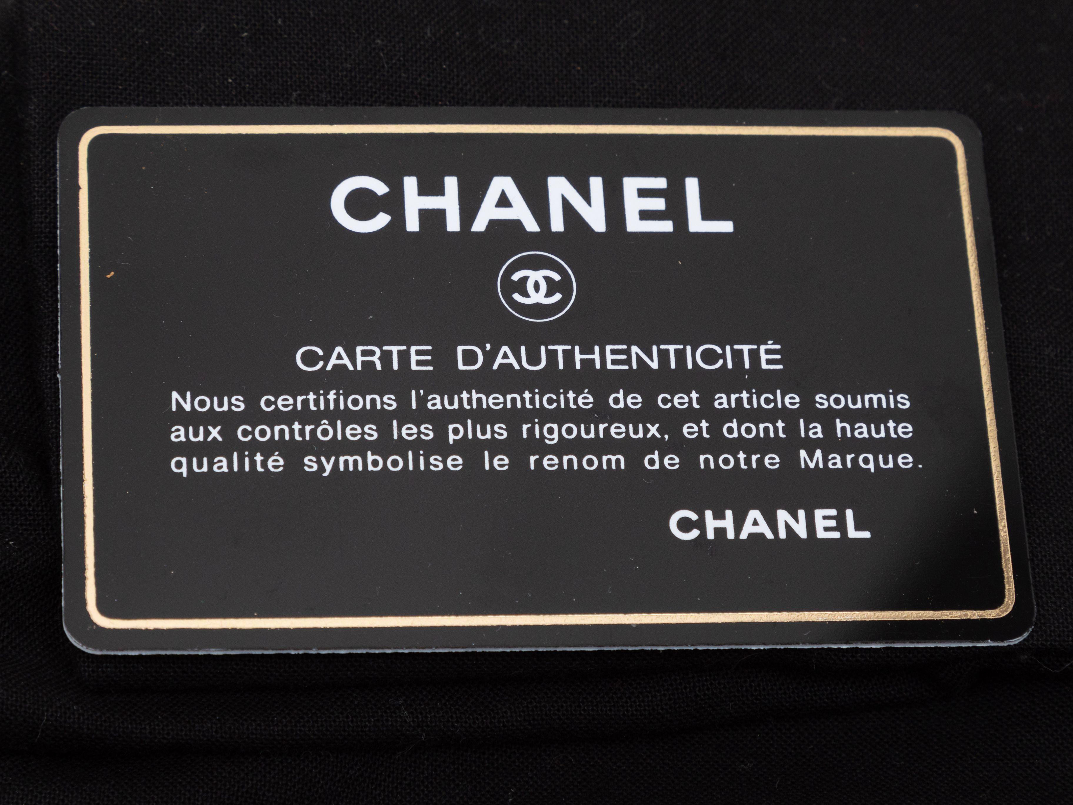 Product Details: Black Chanel 2005 Surpique Lambskin Pochette. This Pochette features a quilted lambskin leather body, silver-tone hardware, contrast stitching throughout, a single chain-link and leather strap, and a top zip closure. 8