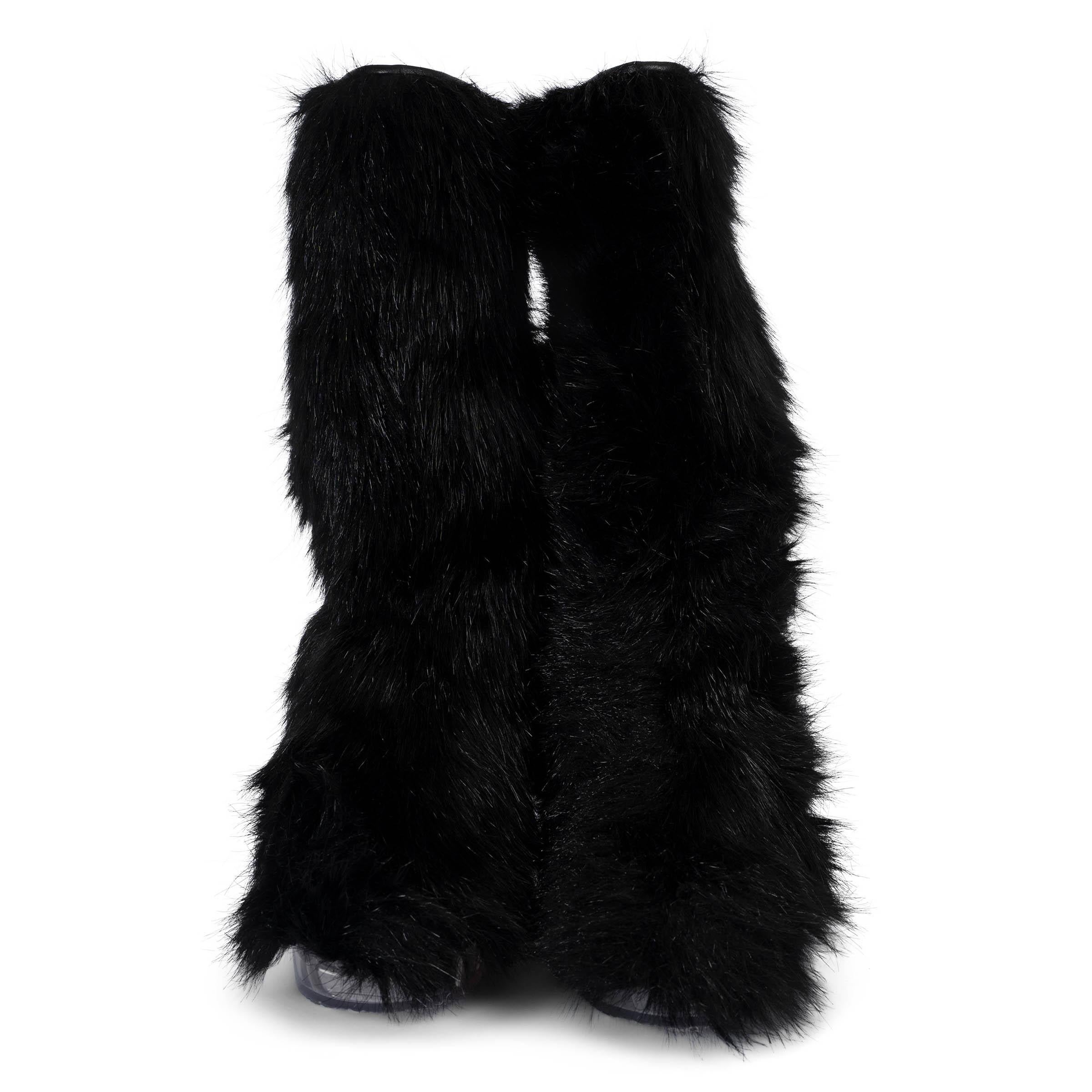 These 100% authentic Chanel mid-calf boots in black faux fur blend bold style with luxury craftsmanship. They feature a unique transparent acetate wedge heel, reminiscent of ice, rounded toes, and a silver-tone metal CC detail on top of the shaft.