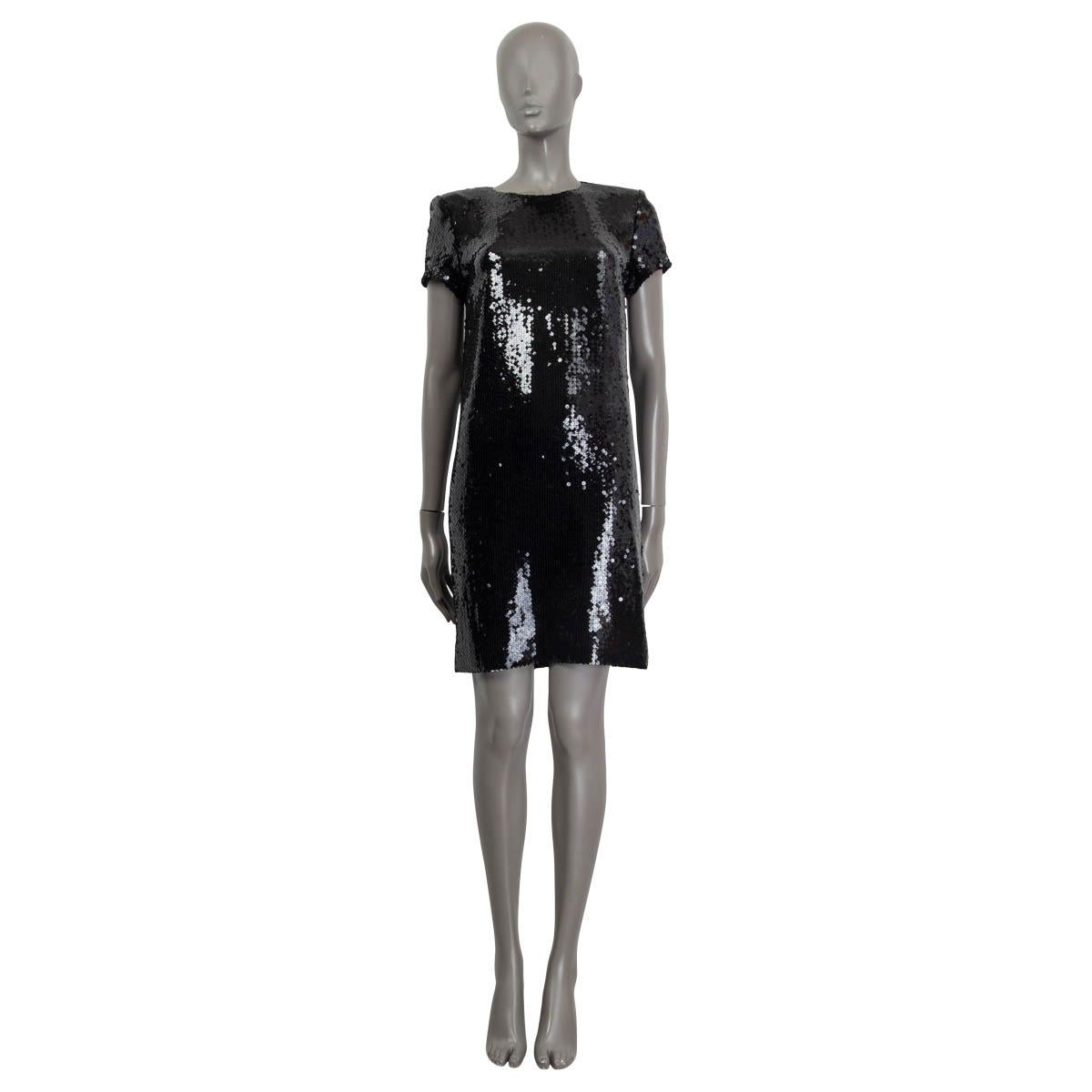 100% authentic Chanel 2018 Hamburg sequin embellished short sleeve dress in black polyester (99%) and polyamide (1%). Features padded shoulders and a 'CC' emblem at the sleeve. Opens with a concealed zipper and a hook at the back. Lined in black