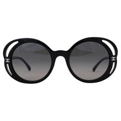 Chanel occhiali da sole neri 23K BOLD CAMELLIA 71572