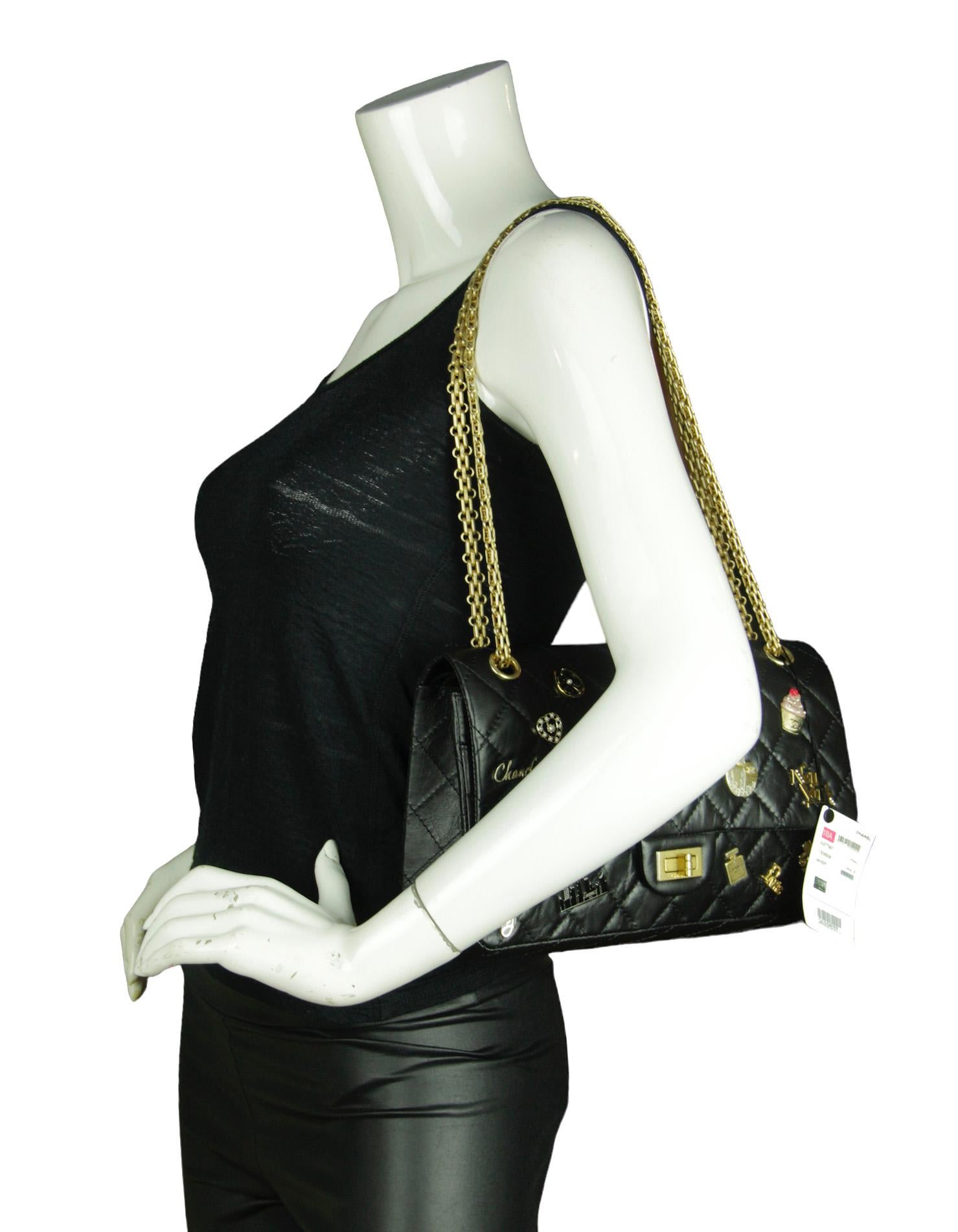 Chanel Black 57th St. Special Edition New York Lucky Charms 226 Reissue Flap Bag.
Features New York themed charm ornaments throughout, reissue twist lock at front and mademoiselle chain link strap

Year of Production: 2018
Color: Black
Hardware: