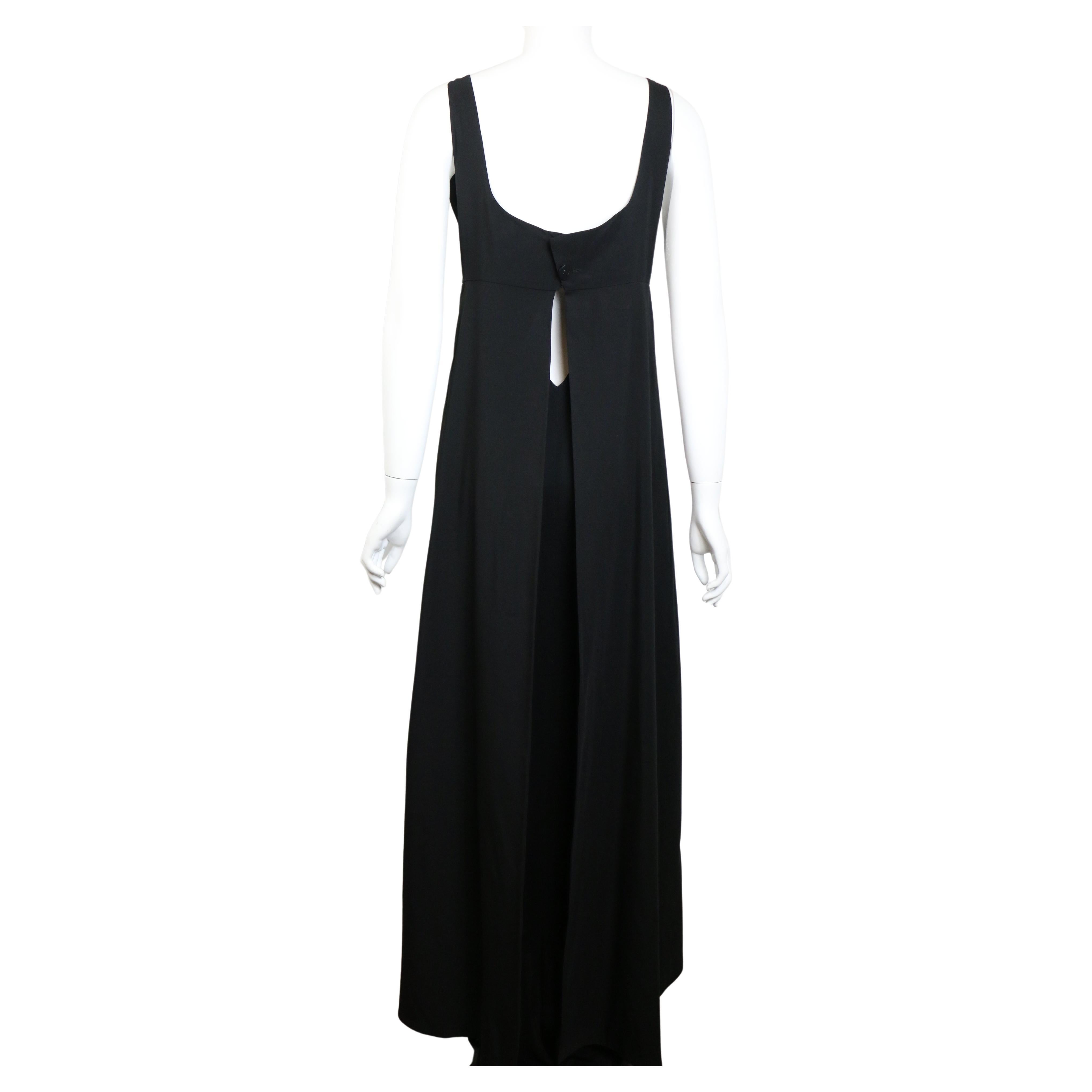 - Chanel black square neck A-Line jersey with split cut at the back maxi dress from 1998 collection. 

- Featuring two layers that first layer is wrapping around the second layer and split cut at the back. Side zipper closure, two side pockets and