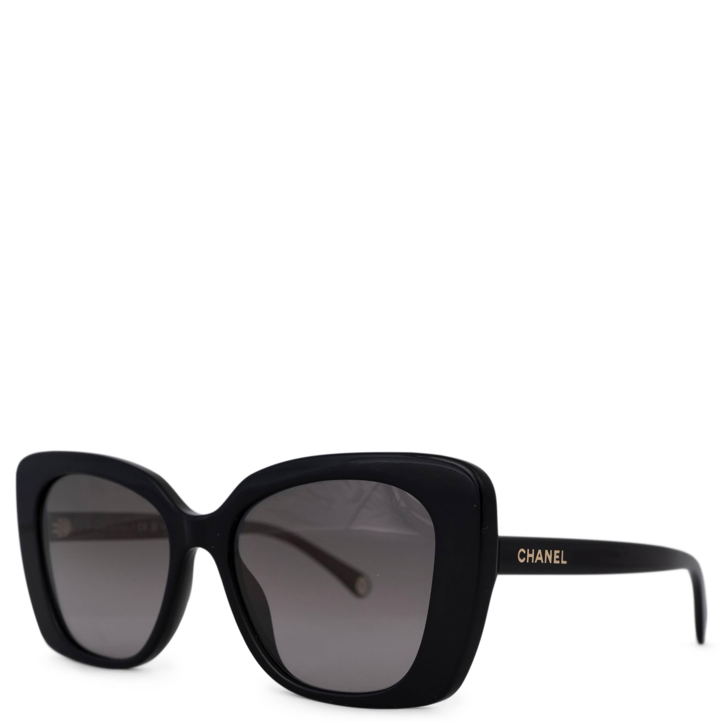 These 100% authentic Chanel rectangular sunglasses are crafted from black acetate and feature gradient light grey polarized lenses for optimal sun protection. The design includes a gold-tone Chanel logo on the temples and the iconic CC at the ends,