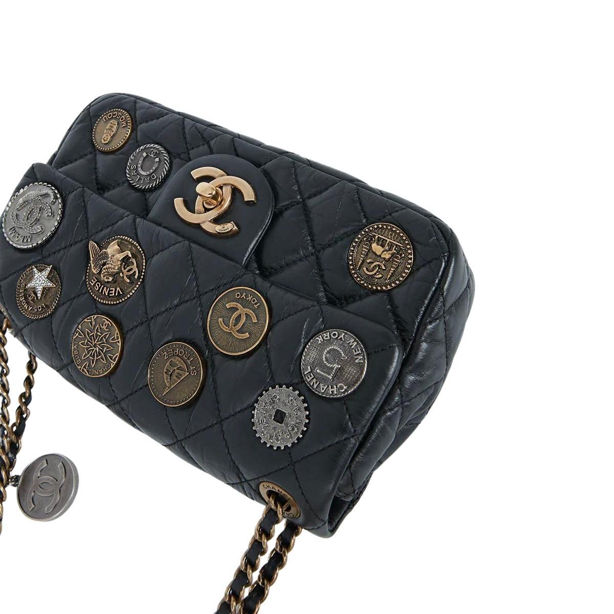 CHANEL Black Aged Calfskin Coin Medallion Mini Flap Bag In Excellent Condition In Brossard, QC