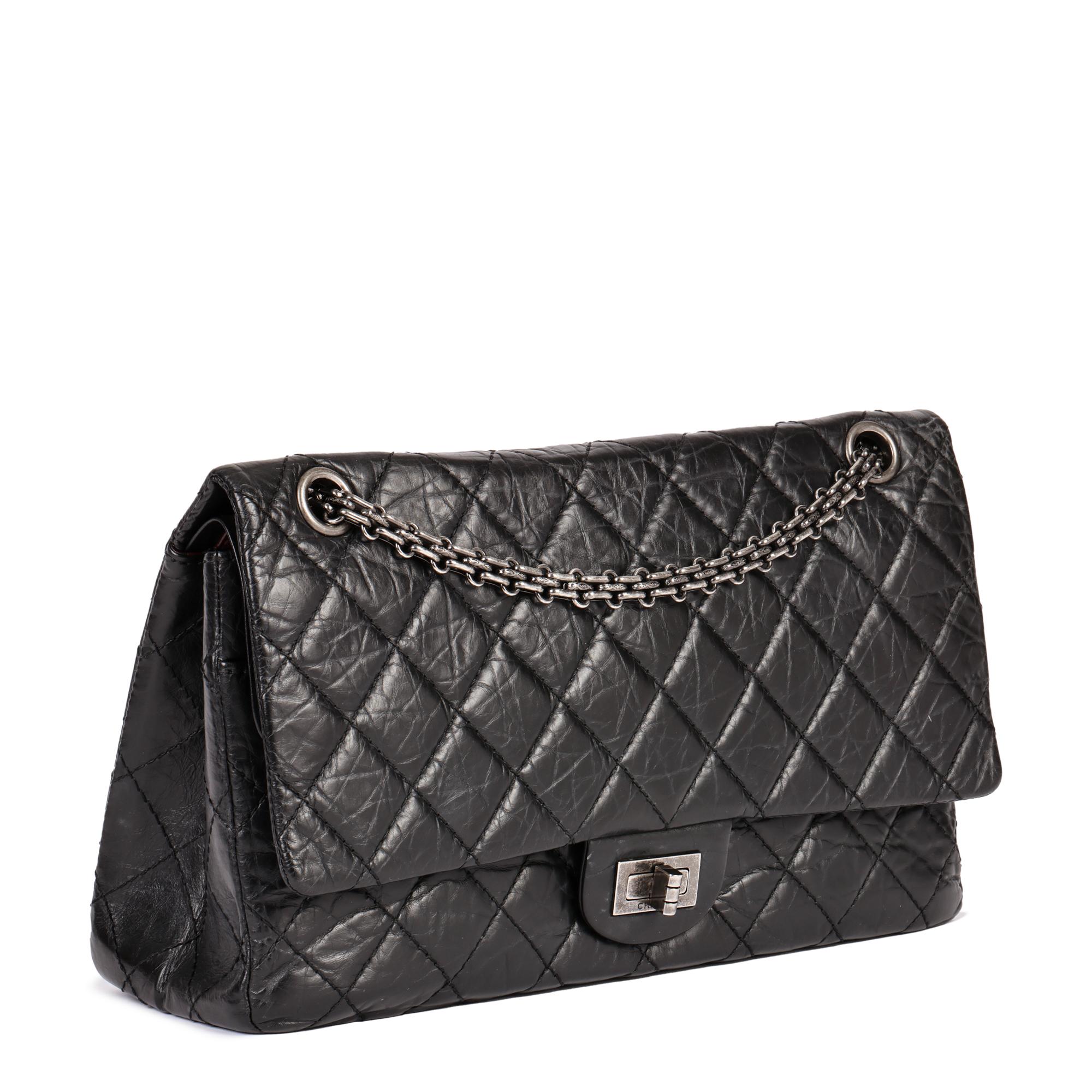 CHANEL
Black Aged Calfskin Leather 226 2.55 Reissue Double Flap Bag

Xupes Reference: HB4851
Serial Number: 12458801
Age (Circa): 2008
Accompanied By: Authenticity Card
Authenticity Details: Authenticity Card, Serial Sticker (Made in France)
Gender: