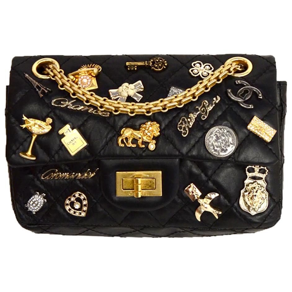 Chanel Black Aged Calfskin Quilted Lucky Charms 2.55 Reissue Flap Bag For  Sale at 1stDibs