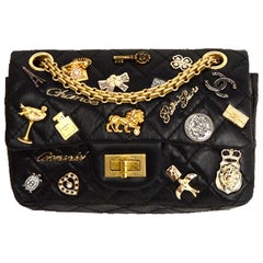 Chanel Black Aged Calfskin Quilted Lucky Charms 2.55 Reissue Flap