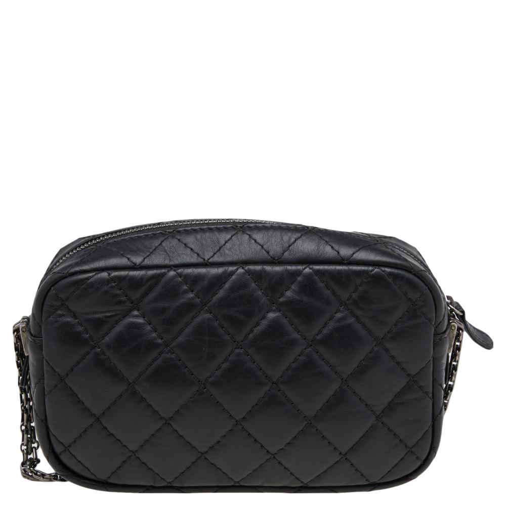 Introduce Chanel's irreplaceable style to your closet with this Reissue Camera bag. Crafted using aged leather, the bag has a signature quilted exterior, the Mademoiselle motif on the front, and a leather-lined interior. Complete with a chain link,