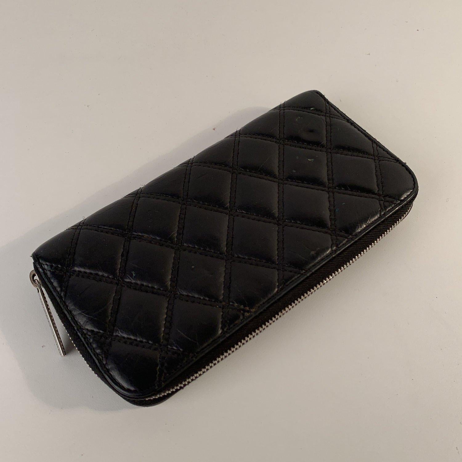 Chanel Black Aged Quilted Leather New York PNY Continental Wallet In Good Condition In Rome, Rome