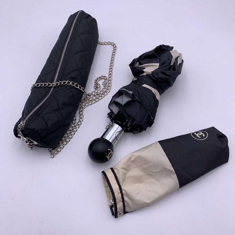 Chanel Black and Beige Camellia Umbrella with Chain Bag Case For Sale at 1stDibs Chanel Black and Beige Camellia Umbrella with Chain Bag Case For Sale at 1stDibs