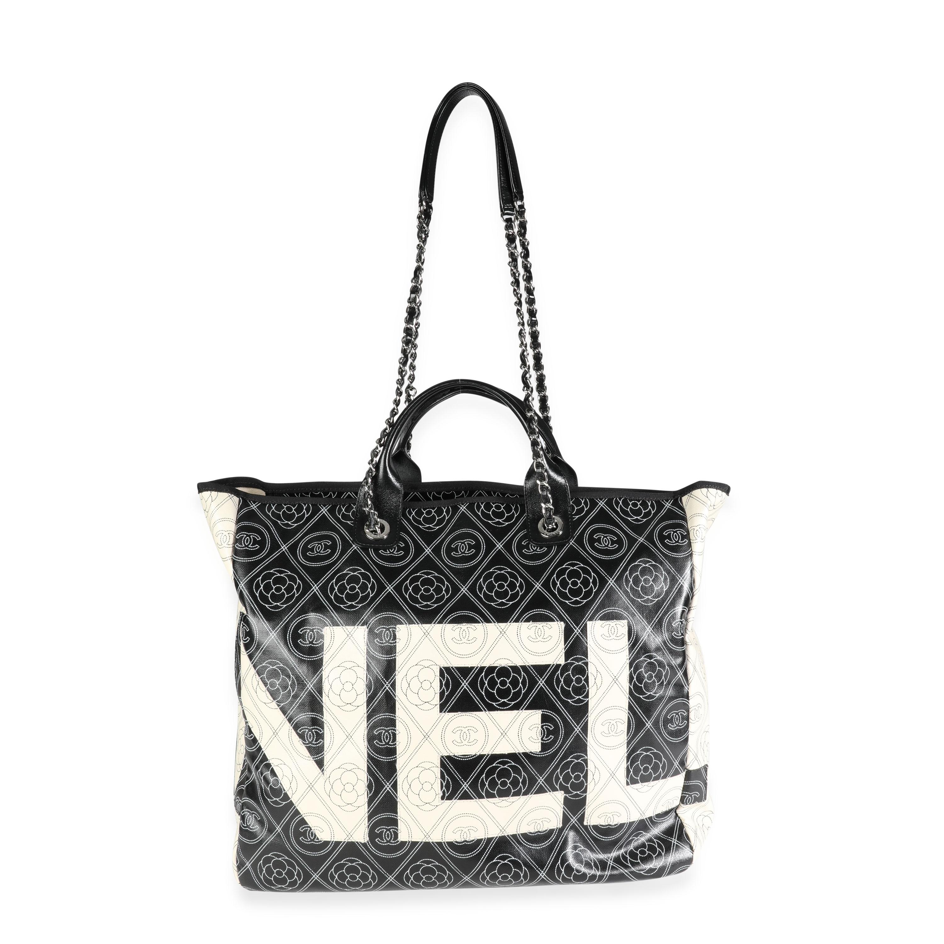 Titolo dell'elenco: Chanel Shopper in tela rivestita nera e beige e pelle con stampa camelia e CC Tot
SKU: 116592
Condizioni della borsa: Molto buono
Commenti sulle condizioni: Condizioni molto buone. Graffi all'hardware. Macchie leggere