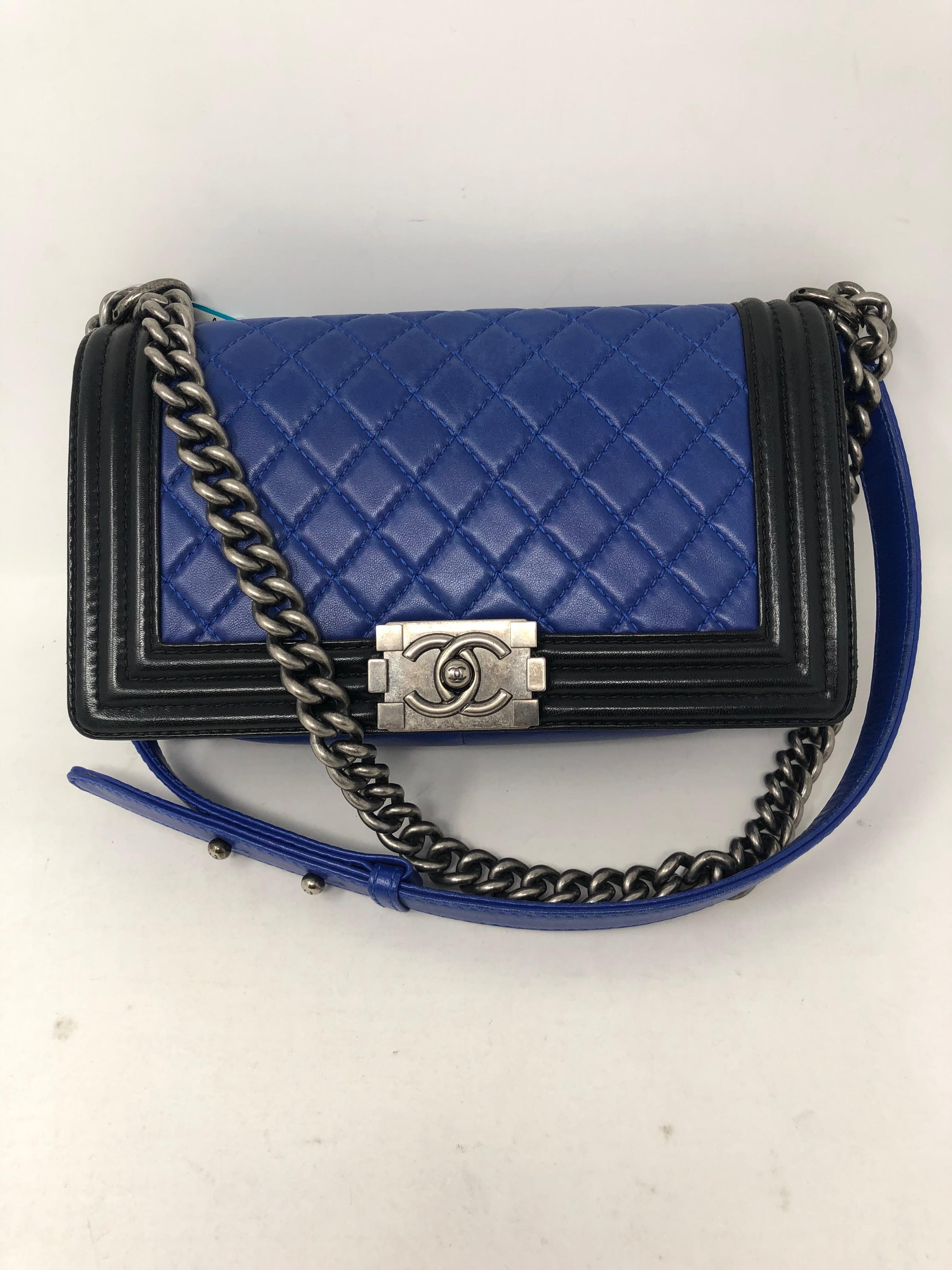 Chanel Black and Blue Boy Bag with Antique Silver Hardware. Good condition. Medium size. Lambskin leather. Unique two-tone leather. Can be worn as a crossbody or doubled as a shoulder bag. Guaranteed authentic. 