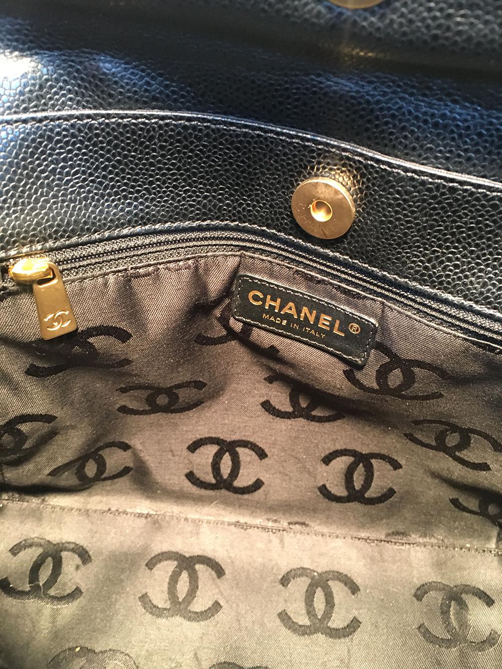 Women's Chanel Black and Cream CC Logo Caviar Leather Handbag