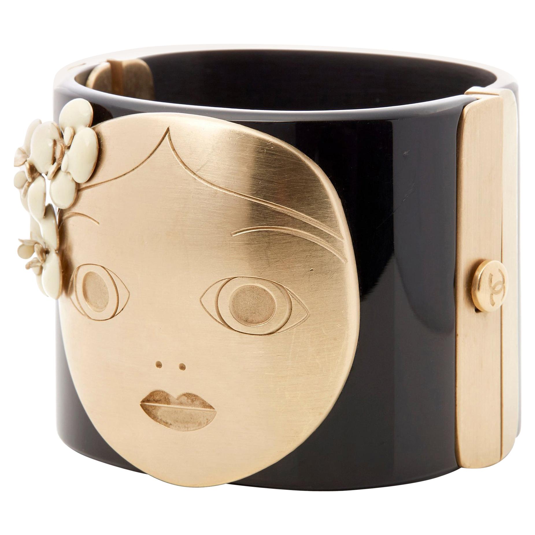 Chanel Black and Gold Tone Matryoshka Doll Cuff Bracelet