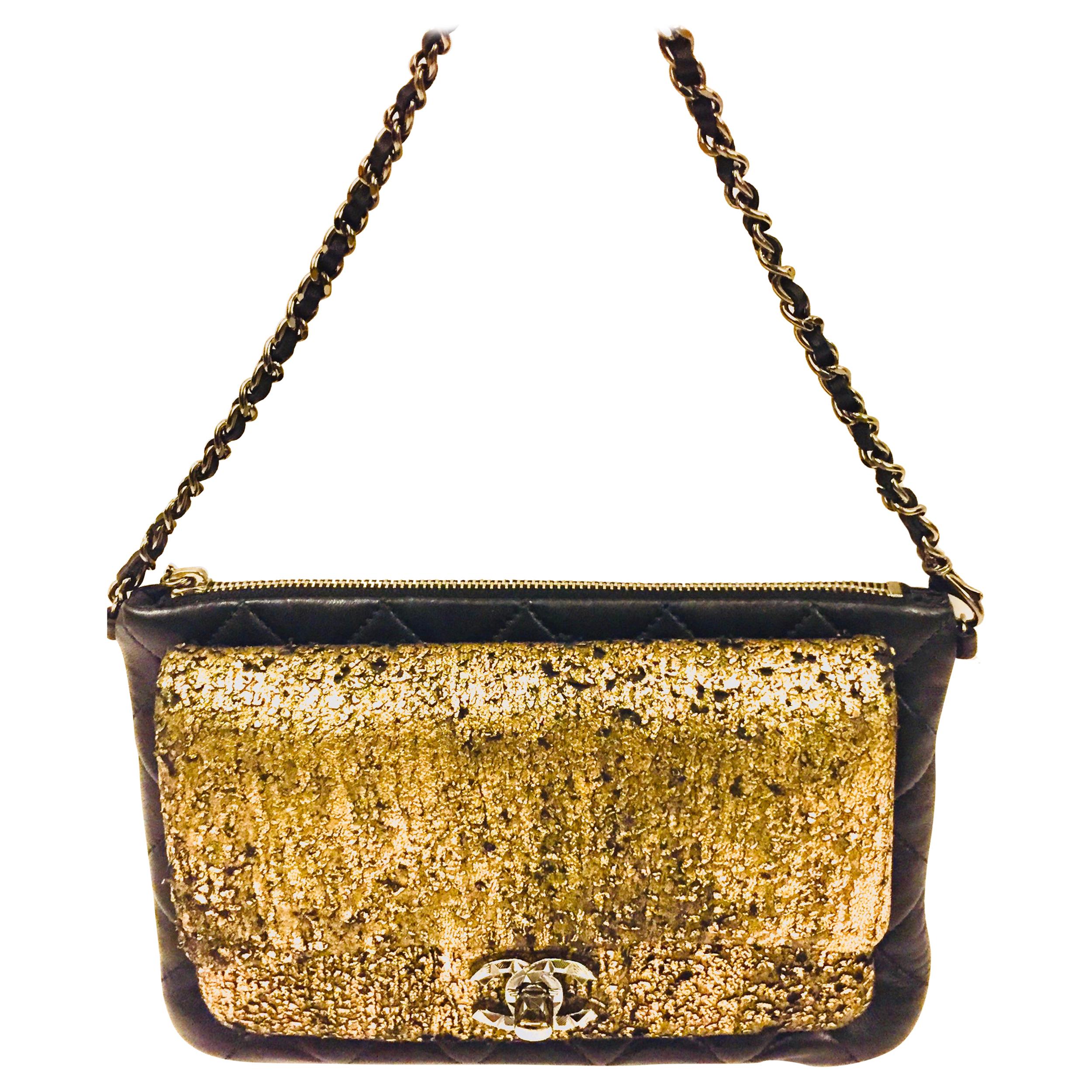 Chanel black and gold wallet/clutch with leather chain strap at 1stDibs