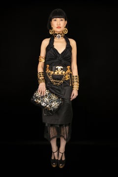 Chanel Black and Golden Flexible Patent Leather Timeless Bag, 2019