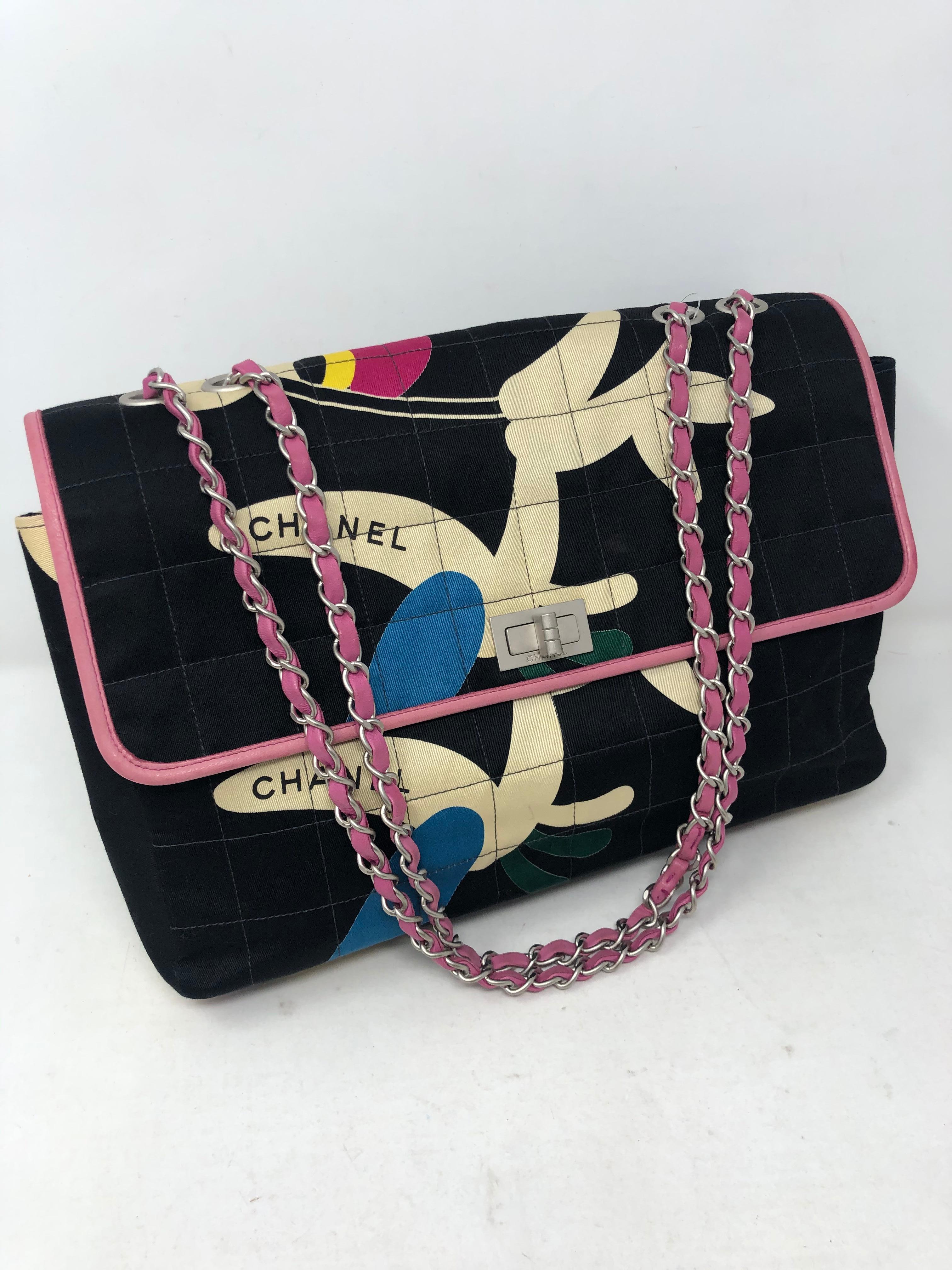 Chanel Cotton Flap Bag with Black, Pink, Blue, Yellow. From 2000-2002 Spring Collection. Good condition. Pink leather straps with silver chain. Includes authenticity card. Serial number inside bag. Guaranteed authentic. 