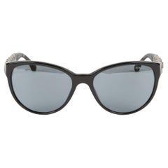 Chanel Schwarze und silberfarbene Ketten-Sonnenbrille