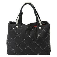 CHANEL Black And White Canvas Tote Bag