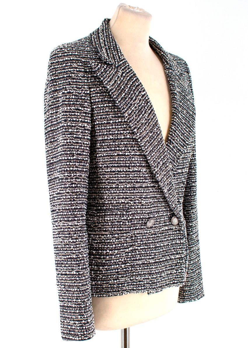 Chanel Black and White Tweed Jacket

-Tweed jacket with silver tone button closure
-Two front pockets
-Notched lapels
-Shoulder pads

Please note, these items are pre-owned and may show signs of being stored even when unworn and unused. This is