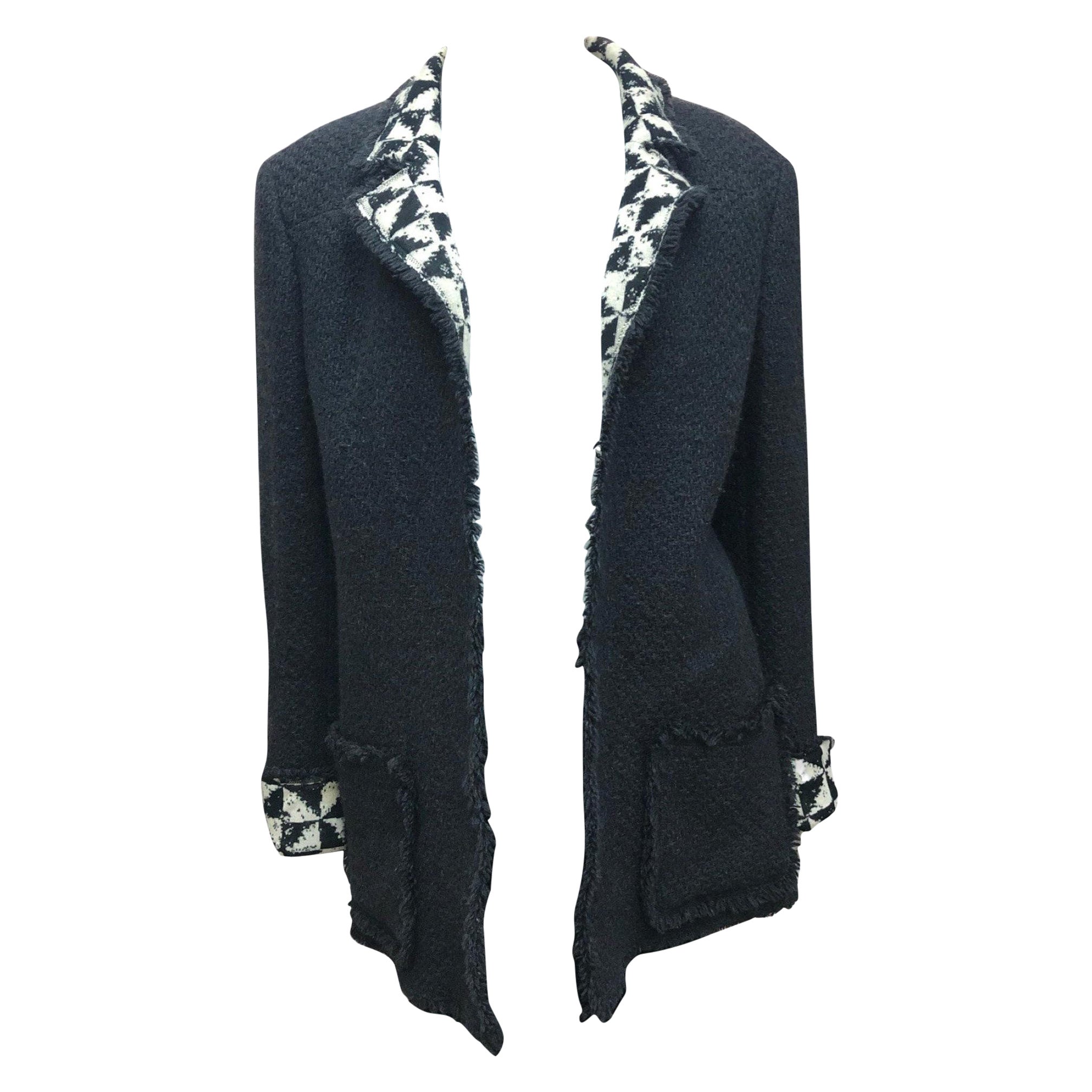 Giacca in tweed di lana bianca e nera di Chanel