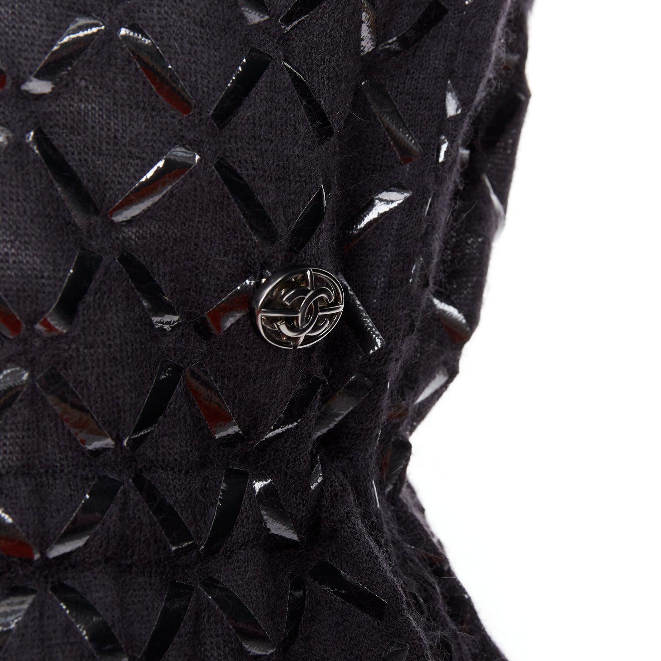 CHANEL black angora blend criss cross shine print knit dress FR36 S
Reference: GEGG/A00104
Brand: Chanel
Material: Angora, Blend
Color: Black
Pattern: Solid
Closure: Slip On
Extra Details: Drawstring detail at waist with CC logo button.
Made in: