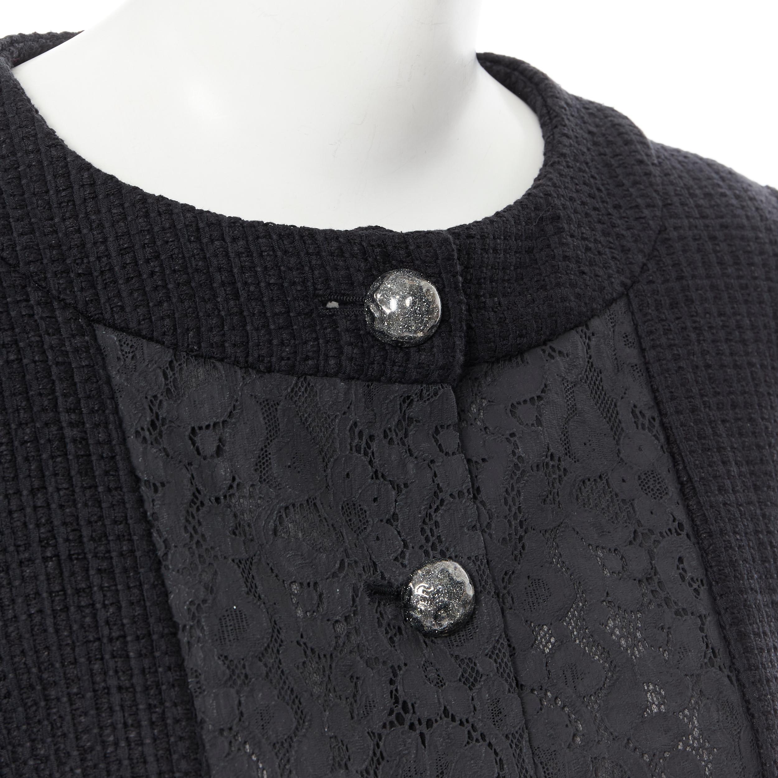 CHANEL black asymmetric lace panel pearl button lattice tweed black jacket FR40 Reference: TGAS/B00152 Brand: Chanel Designer: Karl Lagerfeld Material: Tweed Color: Black Pattern: Solid Closure: Button Extra Detail: Collarless. Asymmetric floral