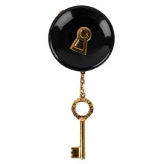 Chanel Black Bakelite and Golden Metal Brooch, 1999