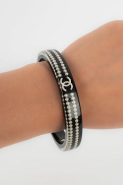 Chanel Black Bakelite Bracelet Embedded with Costume Pearls, 2010