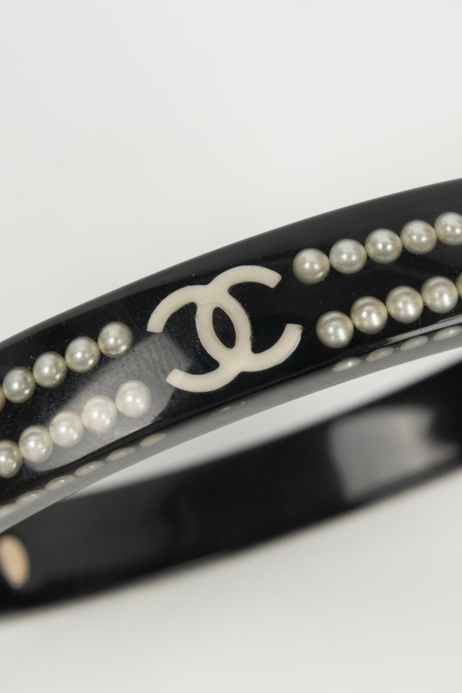 Women's Chanel Black Bakelite Bracelet Embedded with Costume Pearls, 2010
