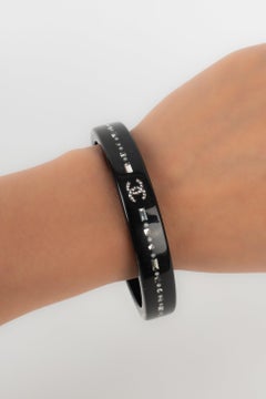 Chanel Black Bakelite Bracelet Embedded with Rhinestones, 2010