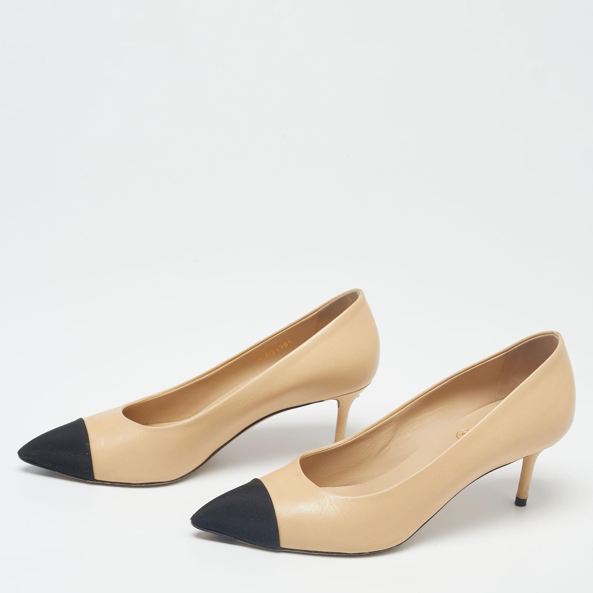 These black and beige pumps from the house of Chanel are truly elegant and poised. They are made from leather and fabric and showcase cap toes. They are made in a slip-on style with pointed toes. Wear them with formals as well as casuals!