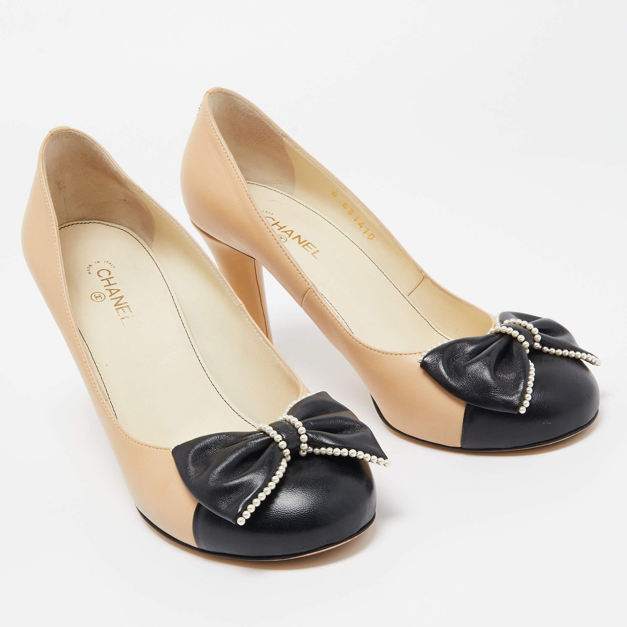 Make a statement with these Chanel two-tone pumps for women. Impeccably crafted, these chic heels offer both fashion and comfort, elevating your look with each graceful step.

