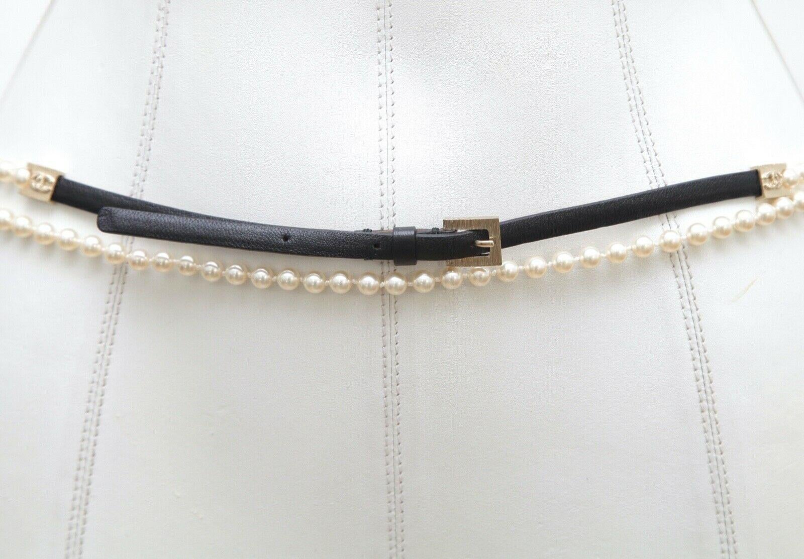 GUARANTEED AUTHENTIC CHANEL DOUBLE STRAND PEARL LEATHER BELT

Details:
- Faux pearl double strand and black lambskin skinny belt.
- Gold-tone hardware.
- Adjustable buckle.
- Comes with Chanel box.

Size: 80

Measurements (Approximate):
- Length: