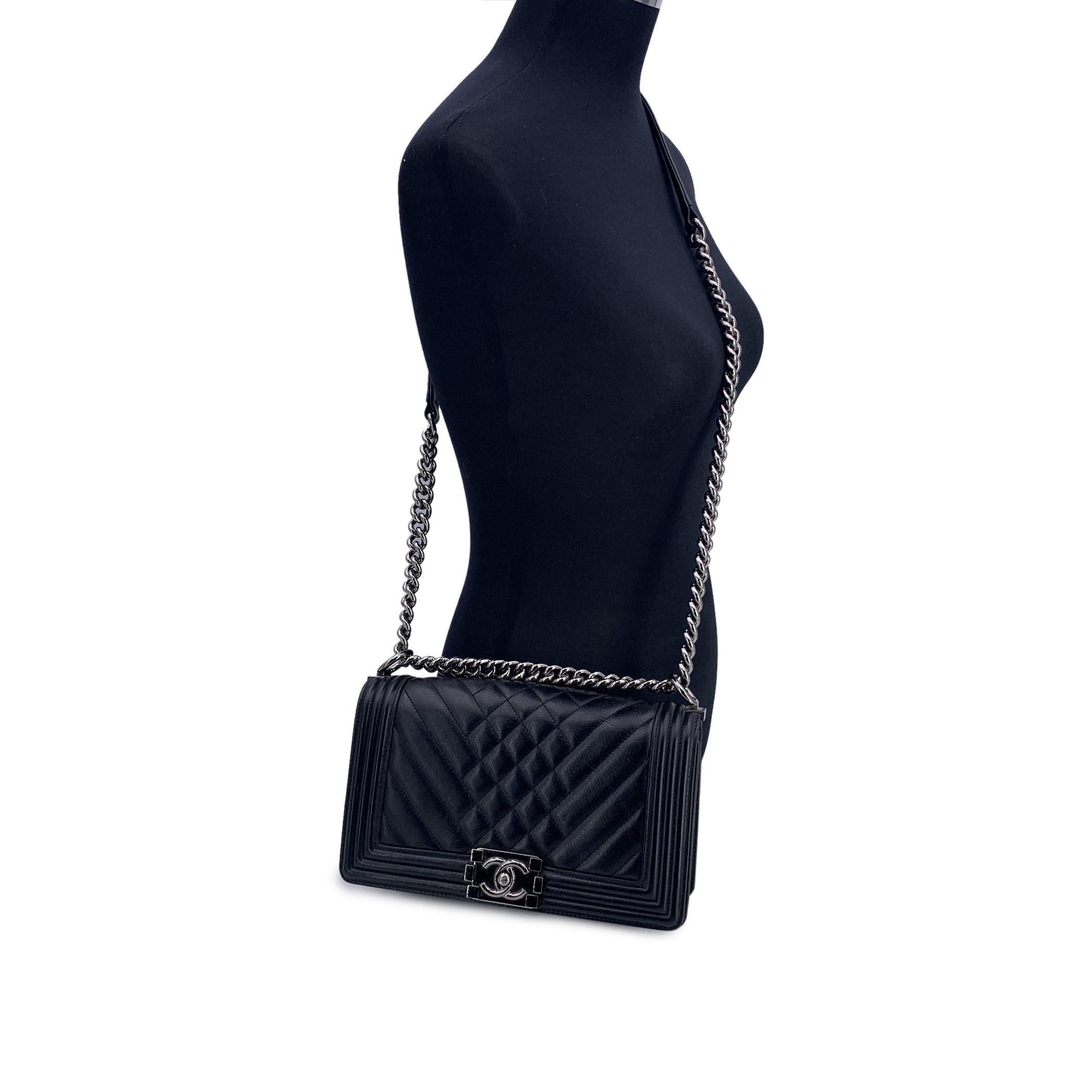 This beautiful Bag will come with a Certificate of Authenticity provided by Entrupy. The certificate will be provided at no further cost. Introducing the iconic Chanel Medium Boy shoulder bag, a stunning blend of timeless design and contemporary