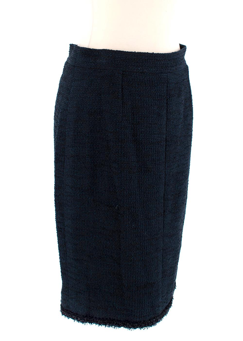 Chanel Black & Blue Boucle Tweed Pencil Skirt

- Cotton blend boulce tweed in black with a blue thread shot through 
- Tonal braided lurex detail to the hem with frayed embellishments
- Concealed back zip and hook & eye closure
- Single vent