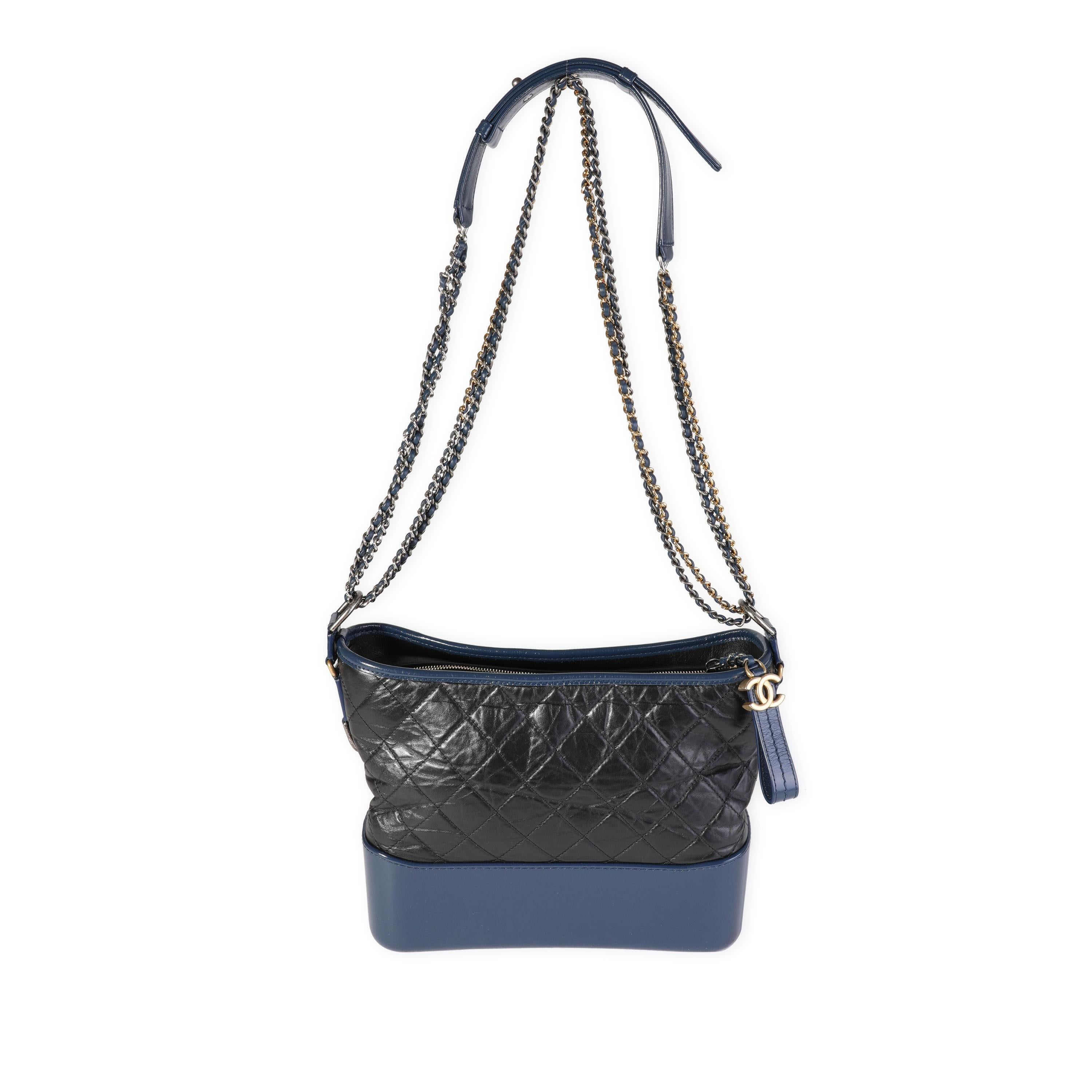 Listing Title: Chanel Black & Blue Quilted Aged Calfskin Large Gabrielle Hobo
SKU: 119004
Condition: Pre-owned (3000)
Handbag Condition: Very Good
Condition Comments: Scratches to corners and bottom. Interior shows signs of use.
Brand: Chanel
Model: