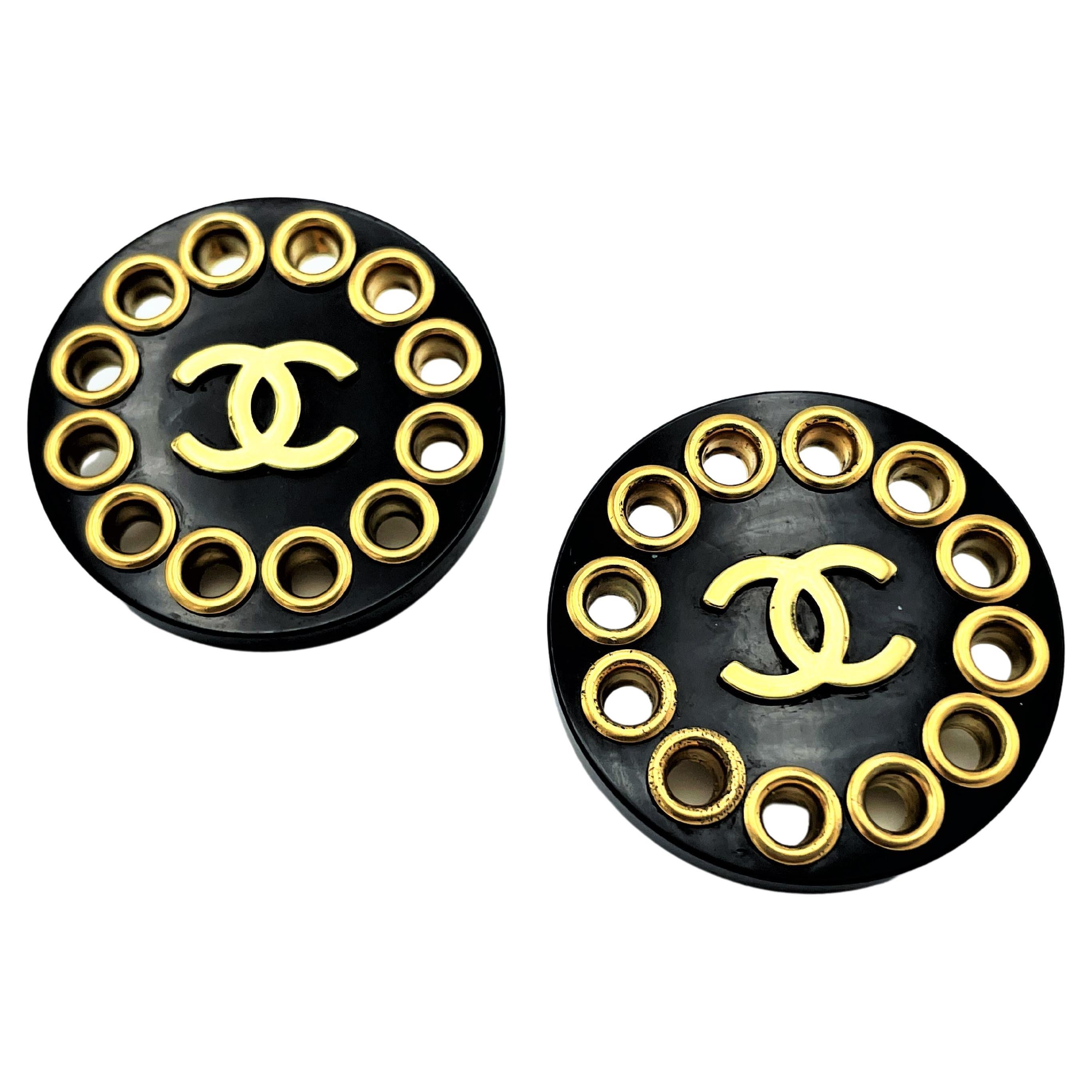 Unique Vintage Chanel black big ball clip on earrings, plastic 1970s with  gold at 1stDibs