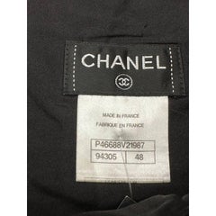 CHANEL Black Bouclé Wool A-Line Skirt with CC Button - FR 48