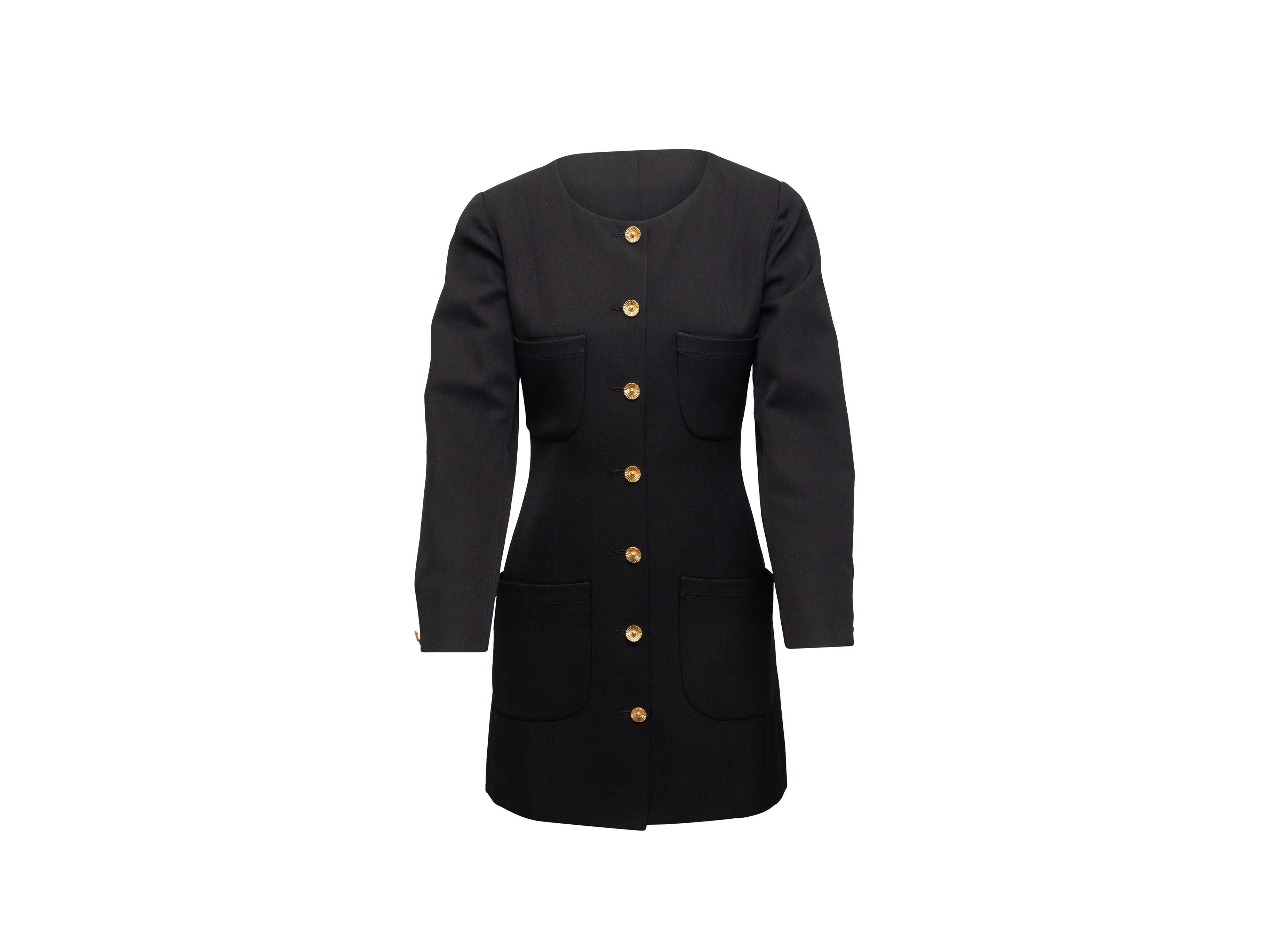 Product details: Vintage black longline wool blazer by Chanel Boutique. Crew neckline. Four patch pockets. Gold-tone button closures at front. 30