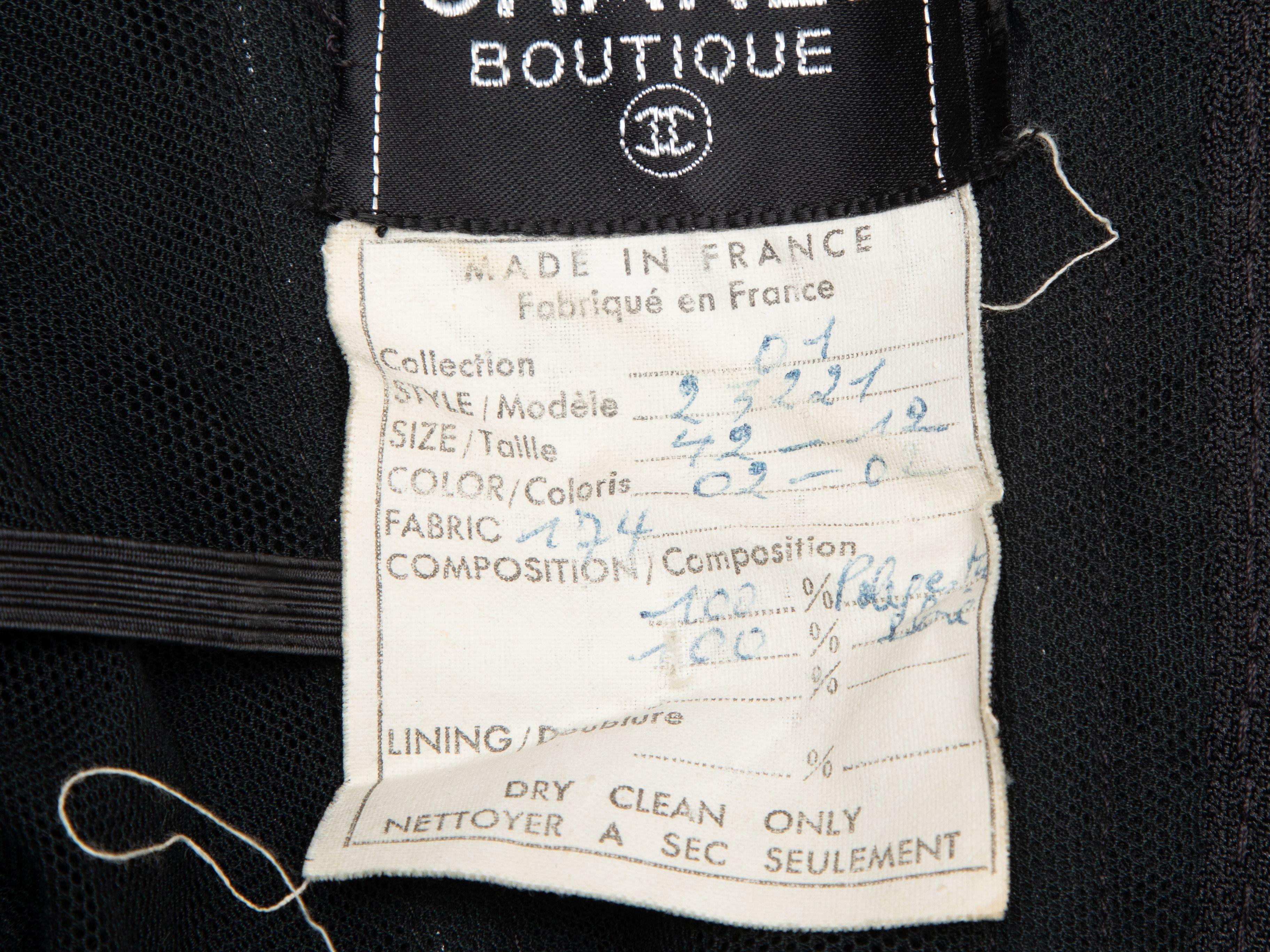 Product Details: Vintage black mesh overlay strapless striped ribbon dress by Chanel Boutique. Zip closure at center back. Designer size 42. 37