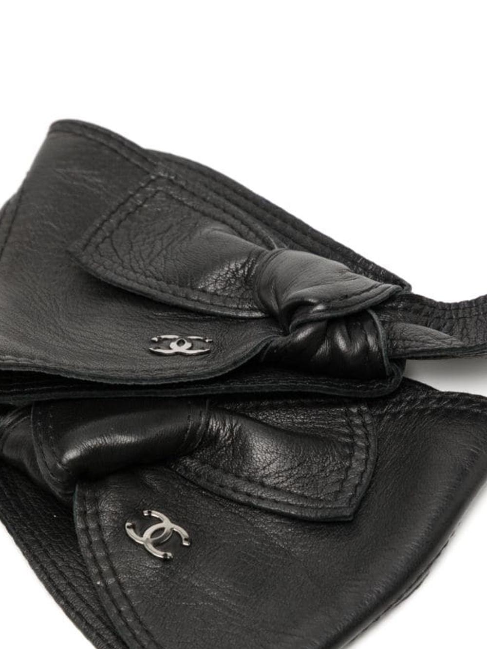 Chanel Schwarze Schleife Fingerlose Handschuhe  für Damen oder Herren