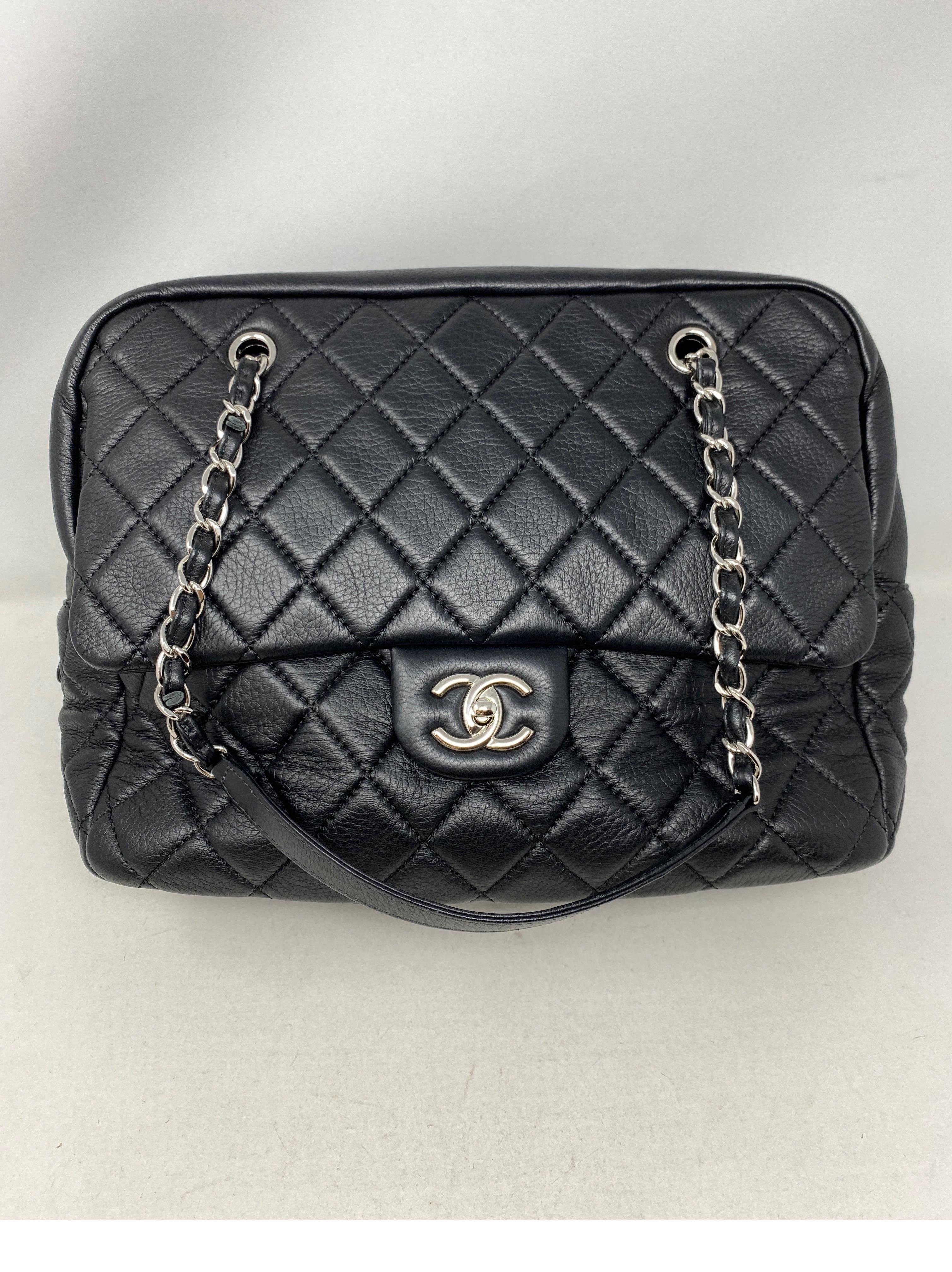 Chanel Black Bowler Tote Bag. Excellent like new condition. Silver hardware. Plenty of room to put your essentials or more in. Soft calfskin leather. Lighter bag. Great everyday bag. Includes authenticity card. Guaranteed authentic.
