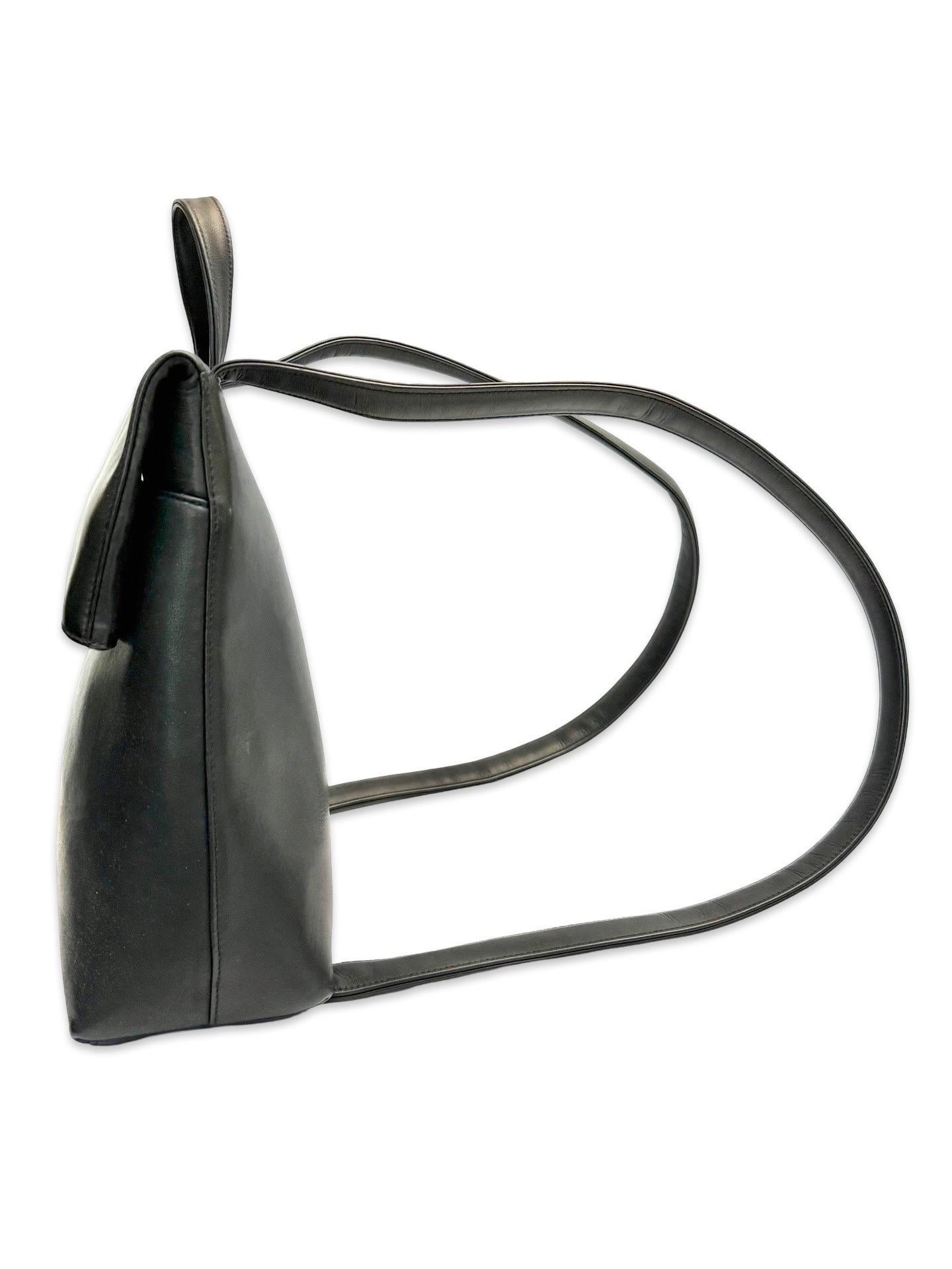 - Chanel black calfskin backpack from 1997 to 1999 collection. 

- Embossed CHANEL. 

- Zip closure. One slip pocket. 

- Nylon Lining. 

- Comes with authenticity card and serial number sticker. 

- Size: W 26 × H 25 × D 8 cm
- Strap Drop: Around
