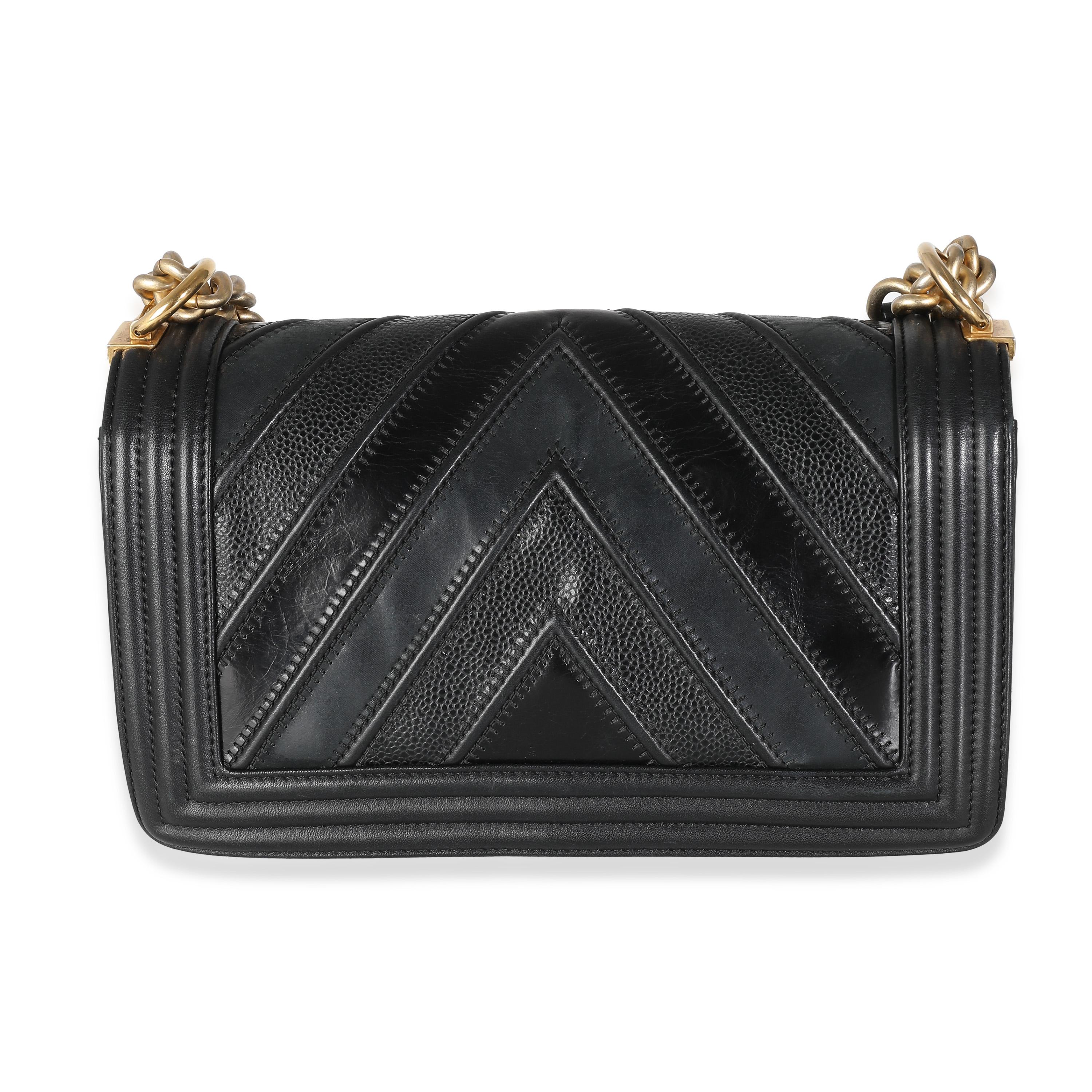 Listing Title: Chanel Black In The Mix Chevron Medium Boy Bag
SKU: U138480
Condition: Pre-owned 
Handbag Condition: Very Good
Condition Comments: Item is in very good condition with minor signs of wear. Minor scuffing and wear to corners. Scuffing