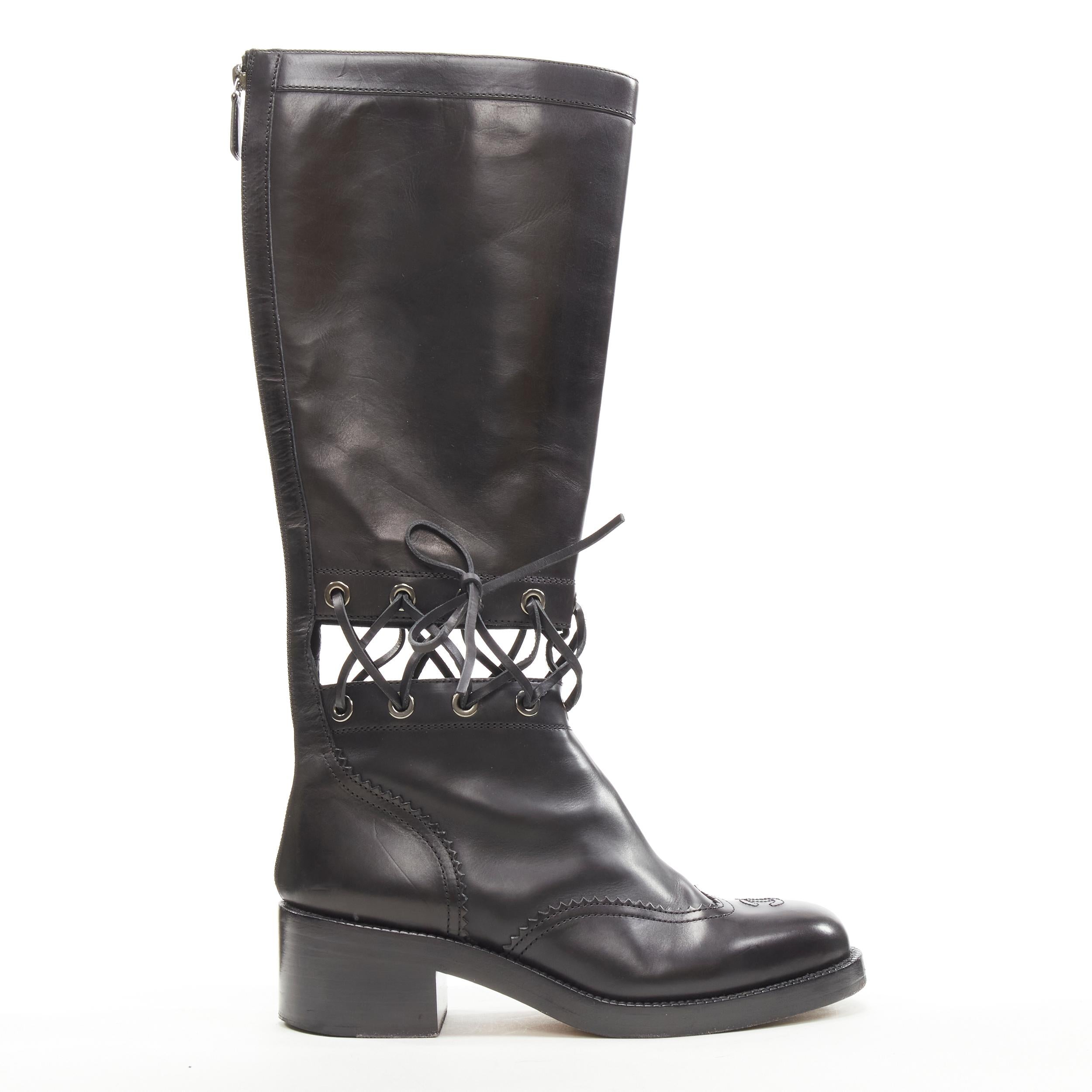 CHANEL black calfskin cross stitch cut out CC toe cap block heel boot EU38.5
Brand: Chanel
Designer: Karl Lagerfeld
Material: Leather
Color: Black
Pattern: Solid
Closure: Zip
Extra Detail: CC logo at toe box. Block heel. Zip back closure.
Made in: