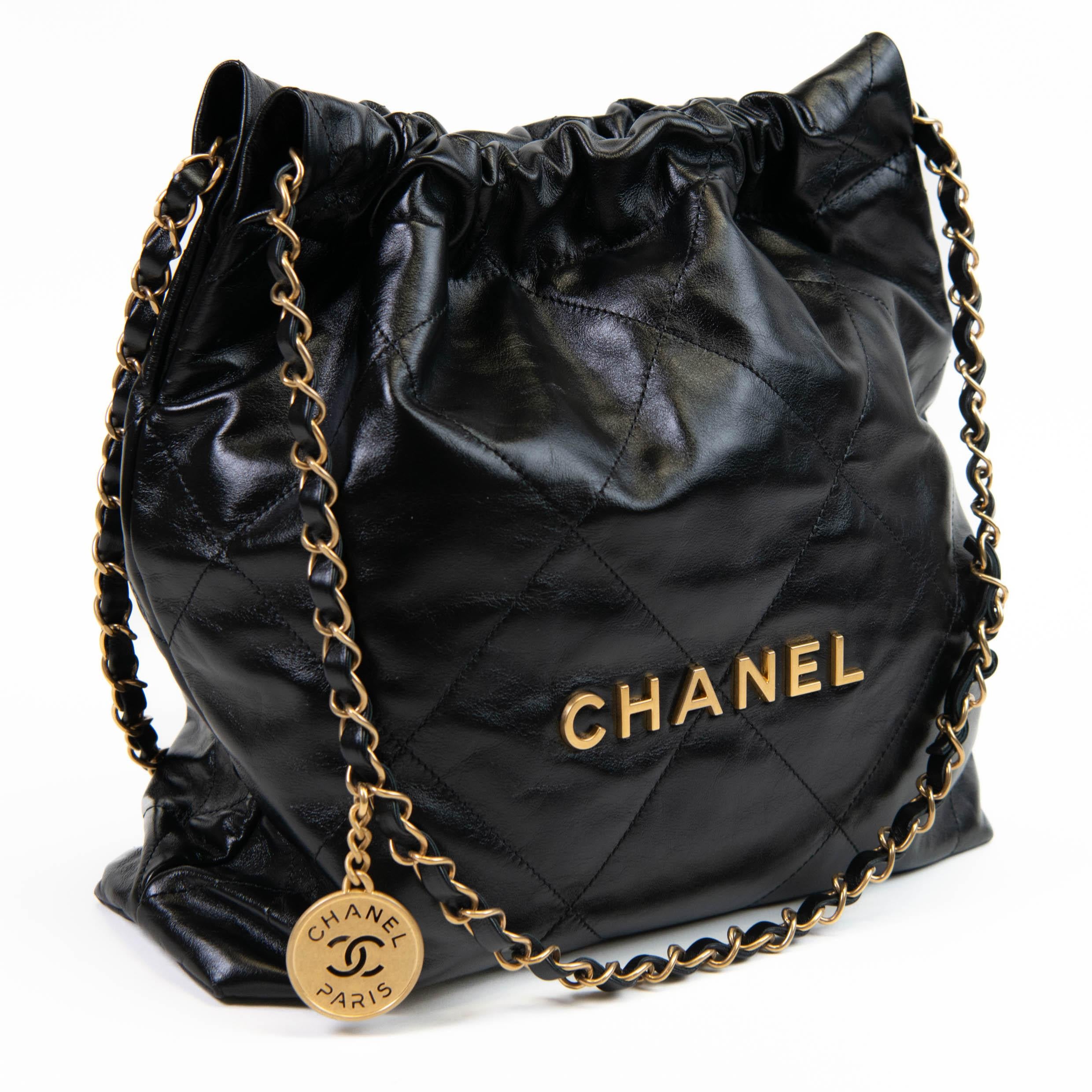 Chanel Black Calfskin Drawstring Chanel 22 Bag Medium Matching Pouch In Excellent Condition In Corona Del Mar, CA