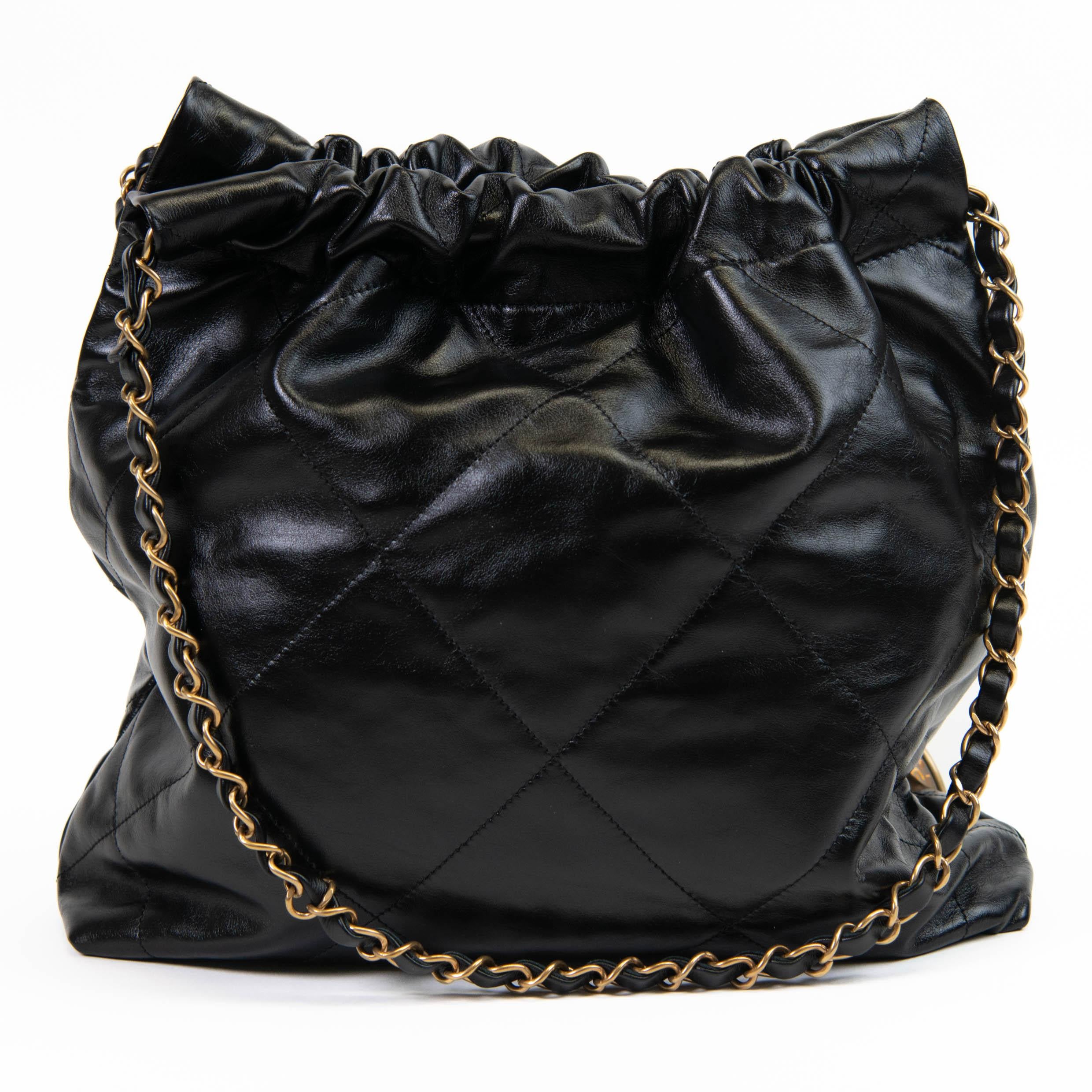 Women's or Men's Chanel Black Calfskin Drawstring Chanel 22 Bag Medium Matching Pouch