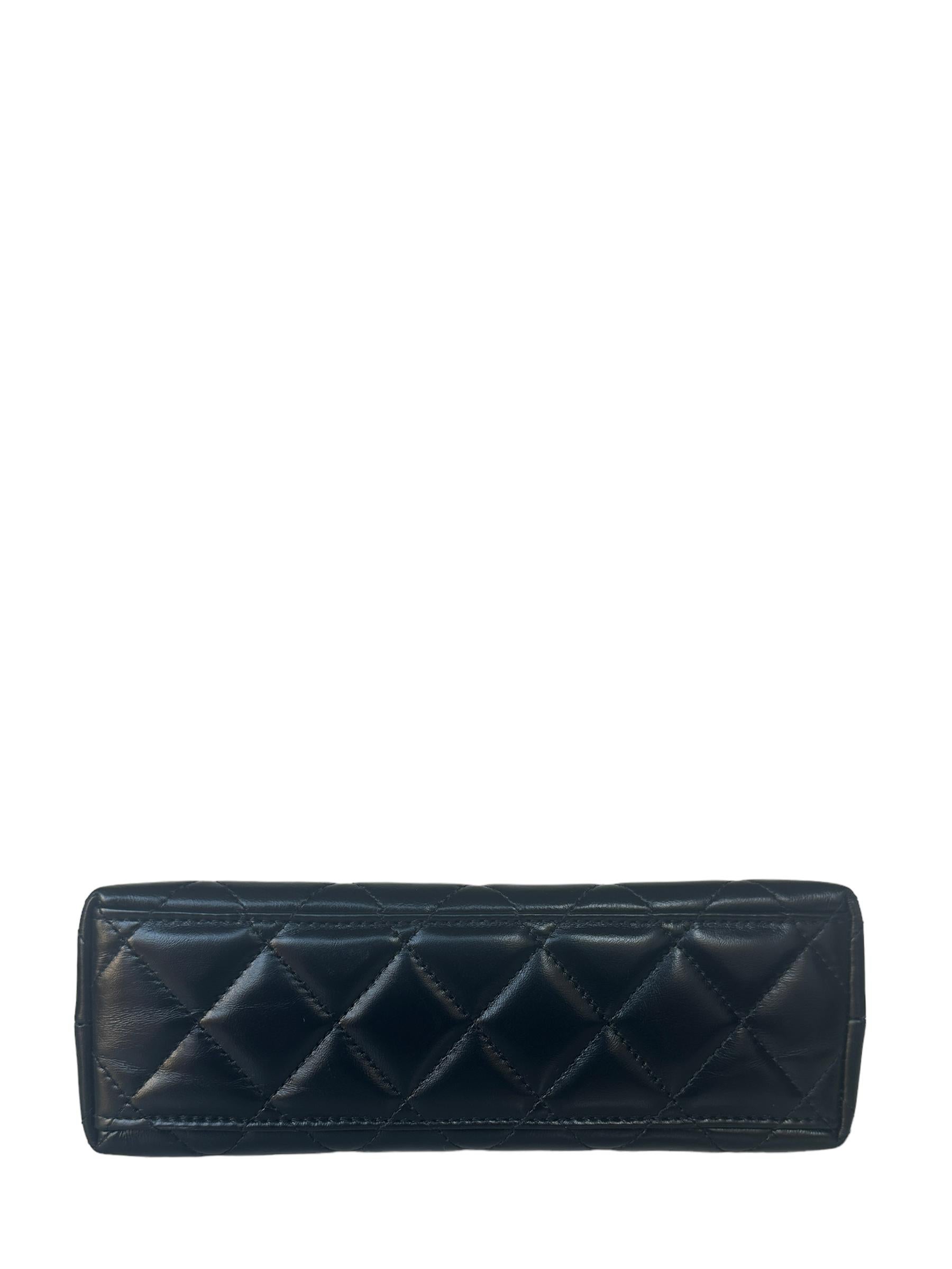 Chanel Black Calfskin Leather Quilted Nano Kelly Shopper Bag

Made In: France
Year of Production: 2023
Color: Black
Hardware: Goldtone
Materials: Aged shiny calfskin leather, metal
Lining: 
Closure/Opening: Center flap with CC twist-lock
Exterior
