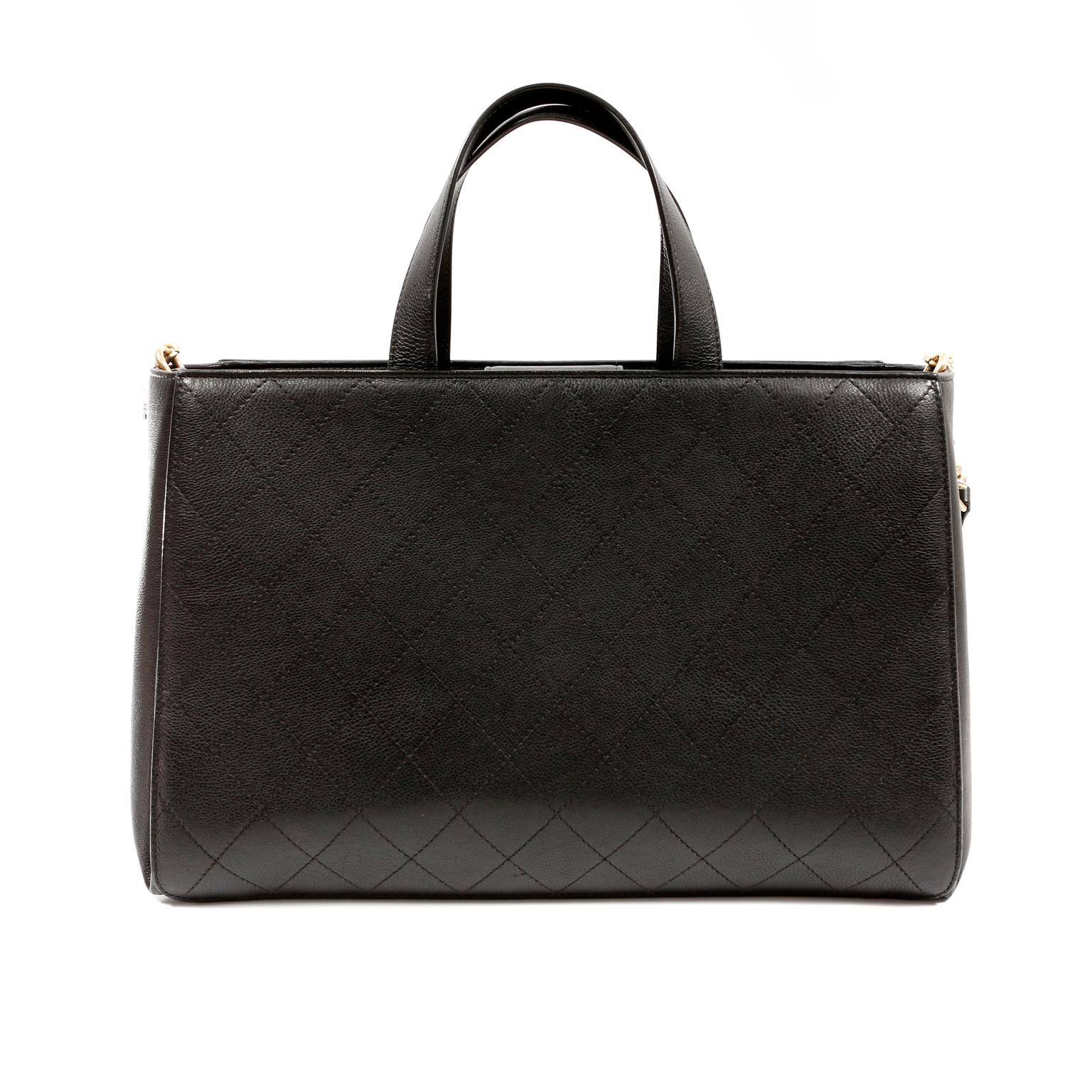This authentic Chanel Black Calfskin Straight Lines Tote is in excellent condition.  The silhouette is highly sophisticated and works well for most any purpose.
Black calfskin tote has topstitched signature Chanel diamond pattern.  Exterior front